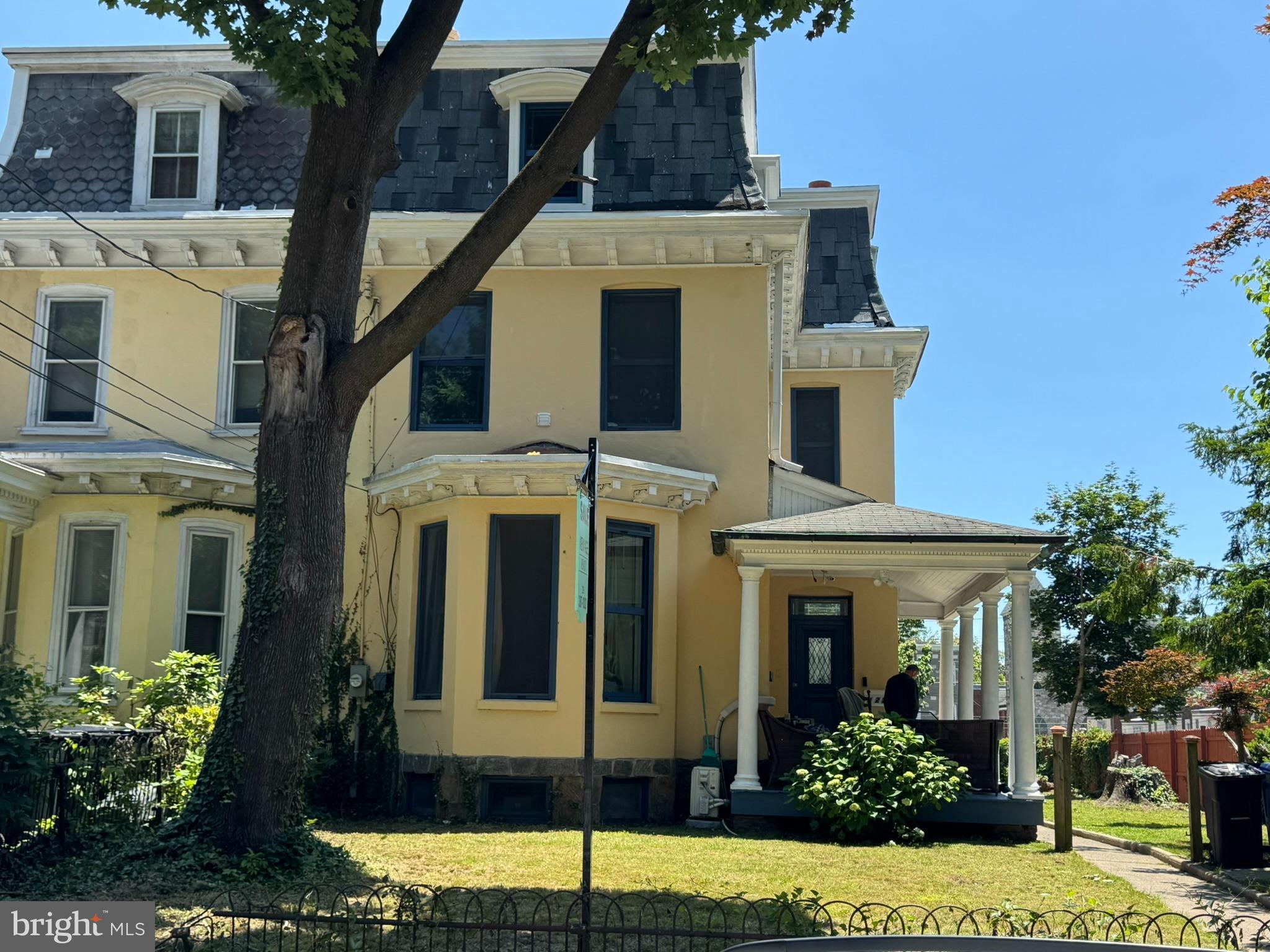 Charming three-story Victorian twin property featuring four units available now! This beautiful property, which takes up half the block, is located on a picturesque tree lined quiet block in historic West Germantown! Perfect opportunity for both owner occupants and investors! The architecture of this house is awesome and the surrounding landscaping is lovely! All units feature beautiful hardwoods and contain classic features. The huge first floor is currently split into two separate units that can easily be re-connected to make a huge unit. The front unit features a full bathroom, kitchen/ living area with a wood burning fireplace. From there, you can venture downstairs into the finished basement via a cool spiral staircase. There you will find a family room area long with an office area and full bathroom. The utility room is also accessed from this space. At the back of this unit is a door that leads into the shared laundry room, which is also accessed by all tenants from the rear door designated ‘laundry room’. This space is used on as needed basis by the Owner. Anticipated market rent for this unit is $1,300. The rear unit of the first floor is accessed from both the common hallway and the side yard. It features one bedroom, living area plus kitchen and full bathroom and private laundry. This Unit 1R is leased at $1,200 per month on a month to month basis with a long term tenant. On the 2nd floor of the building you will find a large 1 bed/ 1 bath unit that is currently leased at $1,245 per month through 10/31/2025. The third floor also features a spacious 1 bed/ 1 bath unit leased at $1,015 per month through 4/30/2026. Currently generating $3,460 per month, or $41,520 per year. Projected rents with Unit 1F leased is $4,760 per month, or $57,120 per year. Owner supplies all utilities. Brand new top main roof installed May 2025. With the nice front porch and spacious side/back yard, there is plenty of space to BBQ and relax in the nice weather! Ideal location - close to plenty of shopping, restaurants, parks/playgrounds and mass transit. Also very close to Penn Charter, Germantown Friends and Green Street Friends Schools, Drexel’s Medical campus and Philadelphia University. Be a part of a very active community with regular email discussion and monthly gatherings. Schedule your tour today!