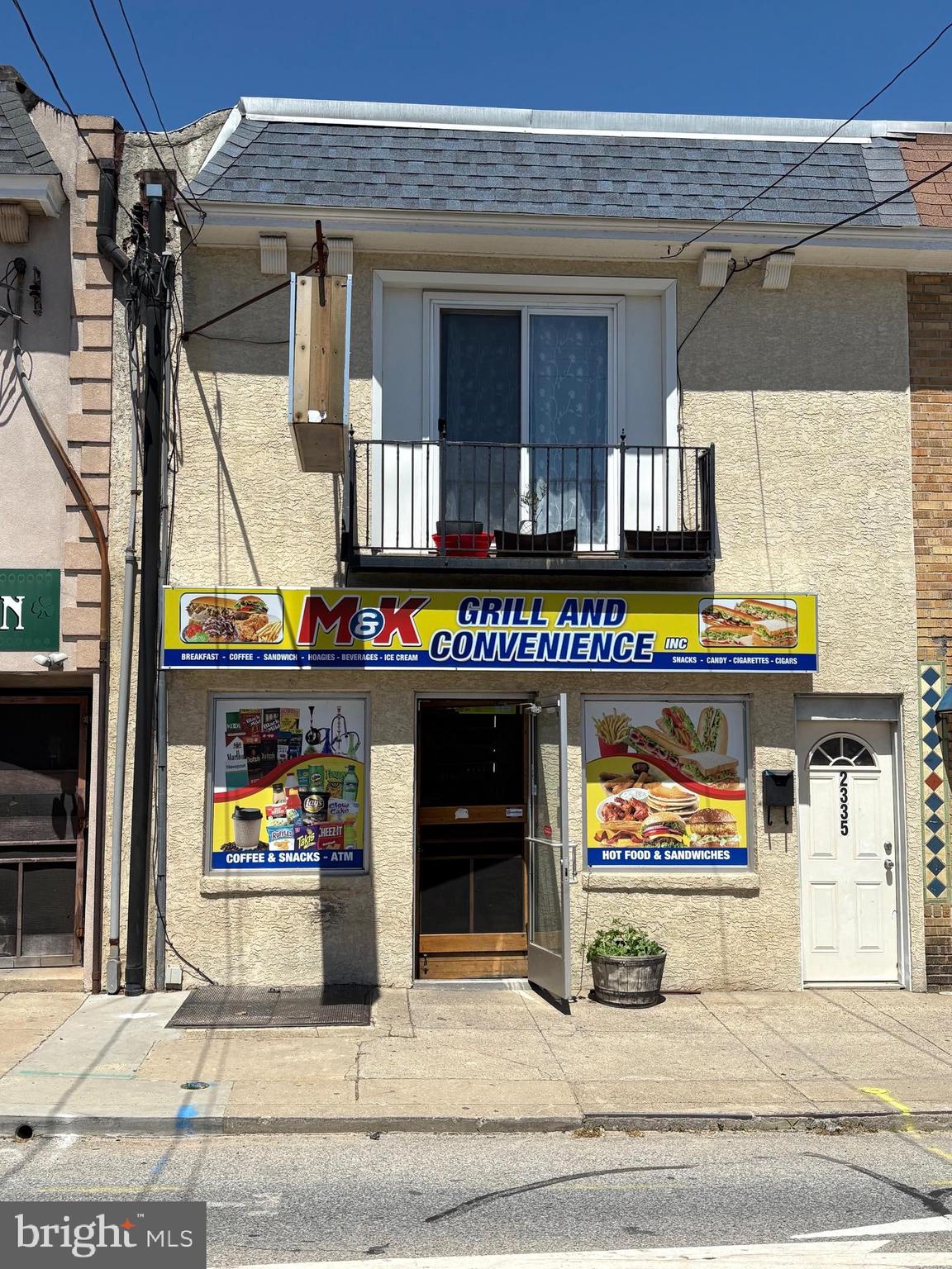 Commercial storefront with 2 bedroom apartment on second floor. Currently a convenience store (former Acropolis Pizza - over 30 years), all restaurant equipment/hood & ansul system still in place. The apartment has been fully remodeled in the last five years. Fully rented. Storefront pays $2,500/month, and apartment pays $1,000/month. Located in the business district of Lansdowne in Upper Darby Township.