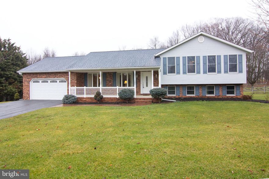 This Beautiful Split Level has so much to offer. Located in popular Finksburg with a very private setting. 3 BR, 2 1/2 Baths, 4 levels, Hardwood floors,  Eat in kitchen w/Granite countertops and large pantry, 2 car garage, Exercise room in lower level, very spacious for entertaining. Beautiful flat land on over 1 acre.  Laundry off kitchen along with Large sunroom off kitchen that leads to outside.  2 car garage and a very large shed in the backyard.  Trex deck with Hot Tub for entertaining. This one won't last long.