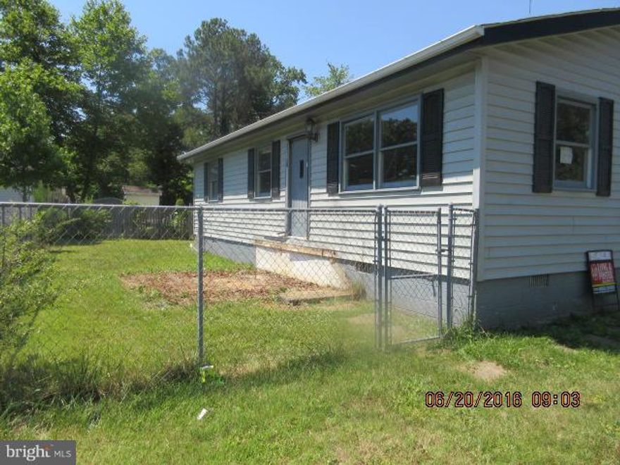 Lots of potential in this three bedroom Ranch style home.  Large country kitchen,  spacious living room, fenced yard.