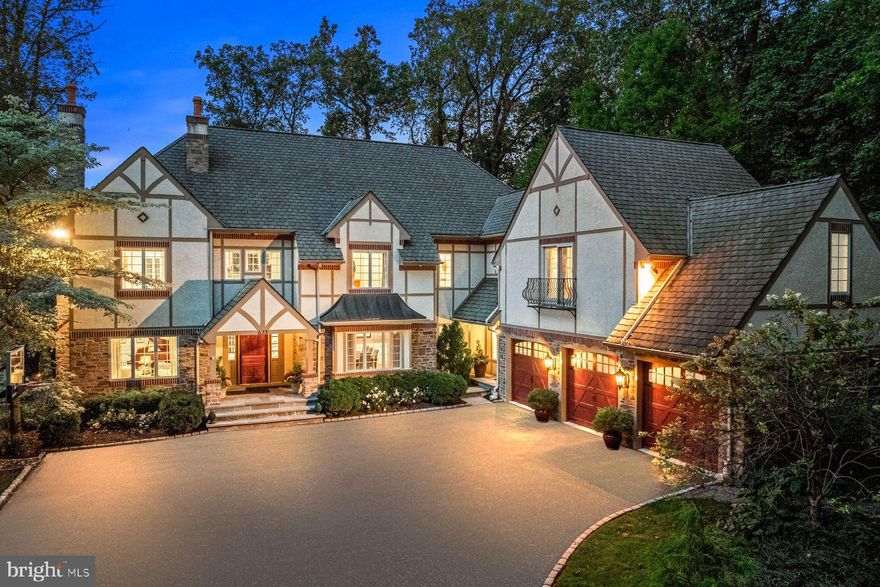Look no further! Move right into this fabulous, impeccably designed, custom built, sun-filled manor home on one of Penn Valley's most coveted streets. Wonderful features and recent improvements include high ceilings with tall windows boasting serene views of the breathtakingly landscaped grounds, custom millwork, moldings and casements throughout, updated systems and lighting, gracious living room with fireplace, office with 2 walls of windows and built-ins, beautiful dining room with an easy open flow to the  modern gourmet kitchen with chef's appliances and designer lighting, bright breakfast room leading out to a private deck, expansive rear terraces, lawn and firepit, spectacular family room with soaring ceiling and stone fireplace, convenient family office within the large mudroom space and 2 powder rooms. The inviting second floor with bright open landing offers a luxurious primary suite with gas fireplace, his and hers walk-in closets and fabulous marble bath with soaking tub and steam shower, oversized shower and 2 custom vanities, 4 additional spacious bedroom suites, all with en-suite bathroom access, including a convenient in-law suite, an over the oversized heated and air conditioned 3-car garage, wonderful walk-out lower level with flexible finished spaces including a gym, home theater, media/ game room, office and an additional bedroom suite if desired with one full bathroom and one powder room. This walkable neighborhood is close to renowned Lower Merion and private schools, universities, endless recreational opportunities, clubs, restaurants, cultural organizations, all forms of transportation, shopping Center City Philadelphia and more!!