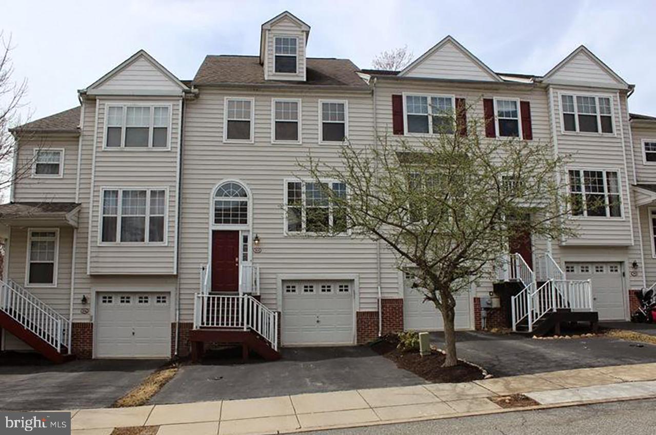 Welcome to 104 Victoria Court, a three-story townhome, located in the Charlestown Oaks development in Malvern, Pennsylvania. This bright and spacious townhome has been recently painted and new carpets installed. It has a one‑car attached garage and driveway parking for two additional cars. In addition, there is ample overflow parking for visitors as well as community tennis courts and playgrounds all within walking distance from the townhome, and in the desired location, where you can also enjoy peaceful and quiet surroundings. Enter the front door into a hallway landing and step up to a spacious open concept living room – dining room combination with powder room, featuring a floor plan that is perfect for entertaining. You will find numerous upgrades throughout, hardwood floors, an eat-in kitchen with marble countertops and a center island with premium lighting, and plenty of cabinets. Adjacent to the kitchen is a walk-in pantry that features built-in cabinetry. At the rear of the house, just steps from the kitchen is a family room that showcases a gas fireplace with custom wood detailing and a cathedral ceiling. From here you have direct access to a spacious deck with plenty of privacy. From the living room, there are stairs to the second floor, which lead to a hallway with two large master suites, one on each side of the home, and each with adjoining en‑suite bathrooms, double closets, and plenty of windows for natural light. The second-floor hallway has a closet for storage and a stairway that leads to a third floor featuring a fully finished bedroom suite with a walk-in closet and a full bath. The lower level is fully finished and features a spacious entertainment area with a sliding glass door that opens to a patio and shared open space. This location allows for easy access to the Pennsylvania Turnpike at Route 29, and nearby the towns of West Chester, Phoenixville, Malvern, King of Prussia. and Wilmington. Shop at Target and Wegman's just minutes away in Uptown Worthington on Route 29. Amtrak and Septa railway lines are within five miles.