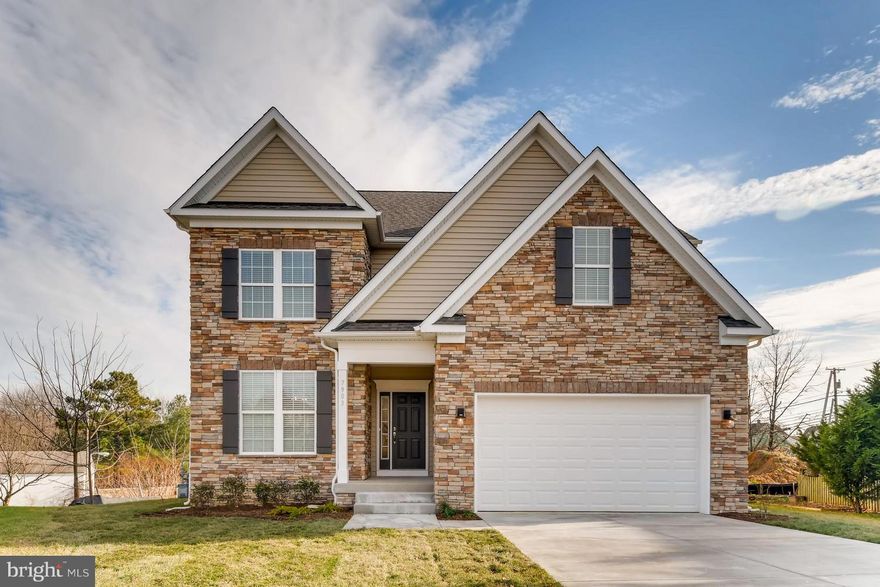 Granite Tops, Hardwood First Floor, Stainless Appliances, Tankless Gas Water Heater, Kitchen Tile Backsplash and Under-Cabinet Lighting, Coffered & Trey Ceiling.  His & Hers Walk-in-Closets, 2nd Floor Laundry, Designer Ceramic Tile in all baths, Butler's Pantry, Ceiling Fans and much more!  Ready for occupancy! Optional Finished Lower Level for $20,000.00.