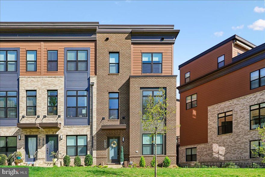 Sought-after and rarely available, this premier corner end-unit in the Reserve at Tower Oaks offers what few can: unobstructed preserve views, exceptional privacy, and sun-filled southwestern exposures.
Completed in 2021, this four-level EYA townhome is ideally positioned to capture glowing afternoon light and open, leafy vistas throughout.
The entry level features a private office with frosted-glass French doors and oversized corner windows, plus access to the two-car garage with built-in storage.
The main level is bright, open, and designed for living and entertaining. The kitchen, dining, and living areas flow seamlessly around a gas fireplace with custom built-ins, complemented by designer lighting, oversized windows, and a walk-out composite deck with pocket screen. A convenient powder room for guests completes this level.
Upstairs, the primary suite offers custom walk-in closets and a spa-like bath with dual vanities and glass-enclosed shower. This level also includes a second bedroom with ensuite bath and a walk-in closet, as well as full-size laundry.
The top floor is dedicated to a spacious family room, third bedroom, and full bath, plus a rooftop terrace with TV and retractable awning—perfect for extending living space across seasons.
Additional features include a full-house activated carbon water filtration system and exterior security cameras.
The Reserve at Tower Oaks community amenities include a pool, fitness center, event space, coffee bar, and package storage. The HOA fee is $249/month and covers trash, snow removal, and lawn care.
This rare residence is superbly situated close to Pike & Rose, Park Potomac, Montgomery Mall, and convenient to I-270, I-495, and the ICC, creating ease of living in an ideal location.