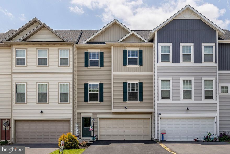 Why choose this home over the others?  We Back to Trees and have a Trex Deck,  Fenced Yard,  Luxury Vinyl Plank Flooring, and Upgraded Tile in the Primary Bedroom!! Oh and  yes a 2 Car Garage!
This impeccably maintained 3-bedroom, 2.5-bathroom townhome offers comfort and convenience, backed by a wealth of outstanding amenities designed to delight residents of all ages.  This larger  townhome boasts a serene backdrop of trees and fenced back yard. Step inside to discover a thoughtfully designed interior featuring upgraded finishes ! 
Recent HVAC maintenance, furnace filter changes, and new water heater elements in 2024, along with a sealed driveway and a smart garage door opener, maintenance worries are a thing of the past.  
The kitchen/dining level welcomes you with an open-concept layout, where the upgraded stainless steel smart appliances shine in the spacious kitchen adorned with upgraded cabinetry and quartz countertops. Gather in the living area or step out onto the Trex deck to soak in the natural beauty . Upstairs, the primary suite awaits, complete with an upgraded primary bath package offering a spa-like retreat . Two additional bedrooms provide ample space for family or guests, while the rough-in bath plumbing in the basement offers to add  a bath if needed.  Outside your doorstep lies a plethora of community amenities, including a playground, picnic pavilion, dog park, bike racetrack, and trails for outdoor enthusiasts of all ages. Cool off in the swimming pools or embark on a swashbuckling adventure at the pirate splash park. Sports enthusiasts will revel in the 15,000 sq. ft. indoor sportsplex boasting tennis, basketball, and volleyball courts, ensuring year-round fun and fitness for the whole family.  Conveniently located near I-81 and Route 11, this townhome offers easy access to shopping, dining, and entertainment options. Plus, with recent HVAC maintenance, furnace filter changes, and new water heater elements in 2024, along with a sealed driveway and a smart garage door opener, maintenance worries are a thing of the past.  Don't miss your chance to experience the epitome of modern living in this extraordinary townhome.
 Schedule your tour today and make this exceptional residence your own!