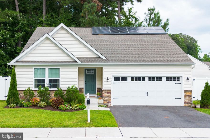 Come see this 3 years young rancher in Delmar. Enjoy one floor living in this private setting within the beautiful Heron Ponds Community. This home features large rooms in the open concept floor plan and a wooded back yard off the rear deck. Convenient to shopping, North Salisbury, and Delaware. Luxury vinyl plank flooring in the common areas and plush carpet in the bedrooms enhance the interior spaces while economical gas heat and owned solar panels create economical living. Yard irrigation, plus fire suppression sprinklers complete the package. Come see it today!