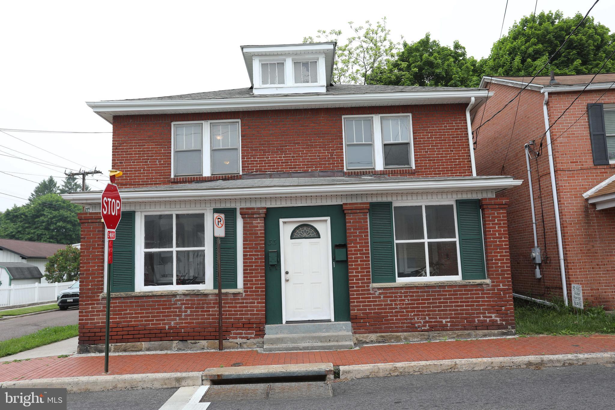 Traditional up/down duplex in the heart of Frostburg! Original woodwork adds charm to the updated kitchens and baths. Lower unit is 1-2 bedrooms/1 bath. Upper unit is 2-3 bedrooms/1 bath. Off street parking, shared/locked enclosed porch for bikes, grill, etc., and just a few short blocks to Main Street. Fully rented. Leases/lead certification on file.