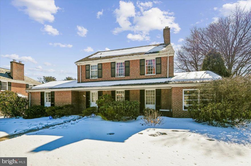 Classic brick colonial in Homeland with four bedrooms, one of which is on the first floor. Two levels of living with the opportunity to have either first floor suite or maintain the space as a family room. Highly sought-after layout within a bucolic setting. Enjoy a quick stroll to the lakes or a relaxing evening in. Preparing a meal is a breeze with the walk-in pantry and new appliances, replaced in 2024-2025. The eat-in kitchen could accommodate a lovely breakfast nook. A banquet-sized dining room, a sizable sun porch, and a flagstone patio give a plethora of options for dining. After a meal, entertain in the living room while enjoying the wood-burning fireplace. With twenty paned windows, eight over twelve, there is an abundance of light throughout the day. A two-car garage supplies plenty of space for outdoor gardening tools, with plenty of extra storage just steps away in the lower-level entry. A large lower level can also be finished to increase square footage and offer a third level of living space. Extensive mature trees and a myriad of outdoor entertaining spaces assure the owner a restorative space, while still being minutes from 83 and 695.