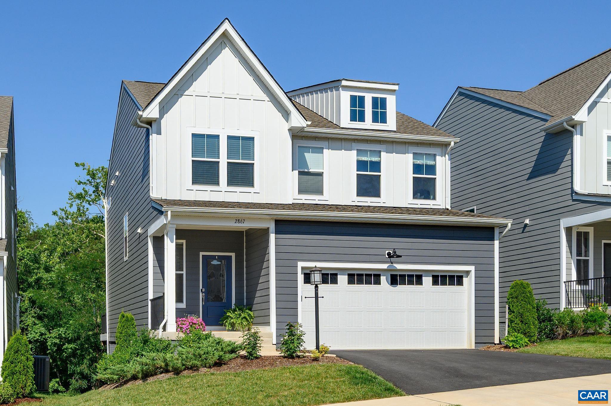 Sparkling, stylish, low-maintenance 4 BR, 3.5 BA home overlooking a babbling brook in vibrant Crozet neighborhood! The abundant natural light and thoughtful, open layout make this home feel comfortable and inviting. Tasteful, sophisticated finishes deliver a chic, contemporary vibe throughout. The kitchen shines with supersized island, gleaming custom tile, Carrera quartz, and high-end appliances. So many extras, including convenient mudroom, loads of storage, and a flex space off kitchen for expanded pantry or homework center. Enjoy wooded views from the family room or relax on the composite deck (with motorized awning!). Handsome open, turned staircase leads to a flexible 2nd-floor loft?perfect for living area, playroom, or office. Luxe primary suite offers spa-like shower, double vanity, walk-in closet, and nearby laundry room. Two secondary bedrooms have walk-in closets too. The mostly finished walk-out basement features bright rec room, bedroom and full bath. This 2023 home is better than new thanks to extensive upgrades and thoughtfully selected design elements. This friendly neighborhood offers trails, clubhouse, fire pits, grills, and play spaces. Walk to downtown Crozet, restaurants, shops, library, and top schools.,Painted Cabinets,Quartz Counter,White Cabinets