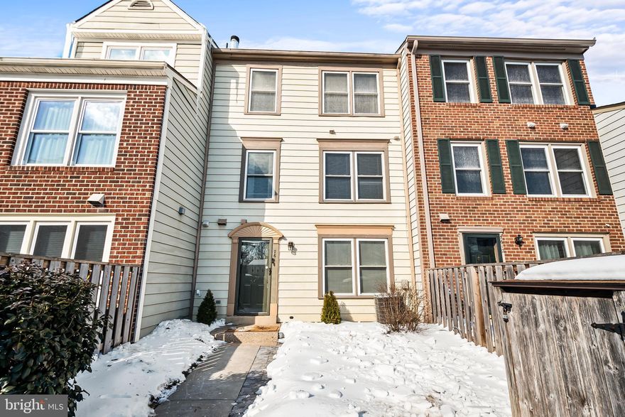 Gorgeous townhome-style condo beautifully renovated in recent years. The gourmet kitchen features granite countertops, stainless steel appliances, newer cabinetry, and a stylish backsplash. The entire home was freshly painted in 2025, with a new roof installed in 2024, flooring was installed on all three levels in 2023. Enjoy the open front patio during the summer months or relax by the cozy fireplace on chilly winter evenings. The expansive primary suite occupies the entire top level and offers a large ensuite bathroom, walk-in closet, and separate dressing area. The second level features two spacious bedrooms (one with a walk-in closet), a full bath, and a separate laundry room. Two assigned parking spaces are conveniently located directly in front of the home, along with ample visitor parking. Ideally located near I-66, Virginia Railway Express, and Bus stops for easy commuting. Close to shopping, dining, trails, Bull Run Park, local wineries and much more. This bright and inviting home is truly a must-see!