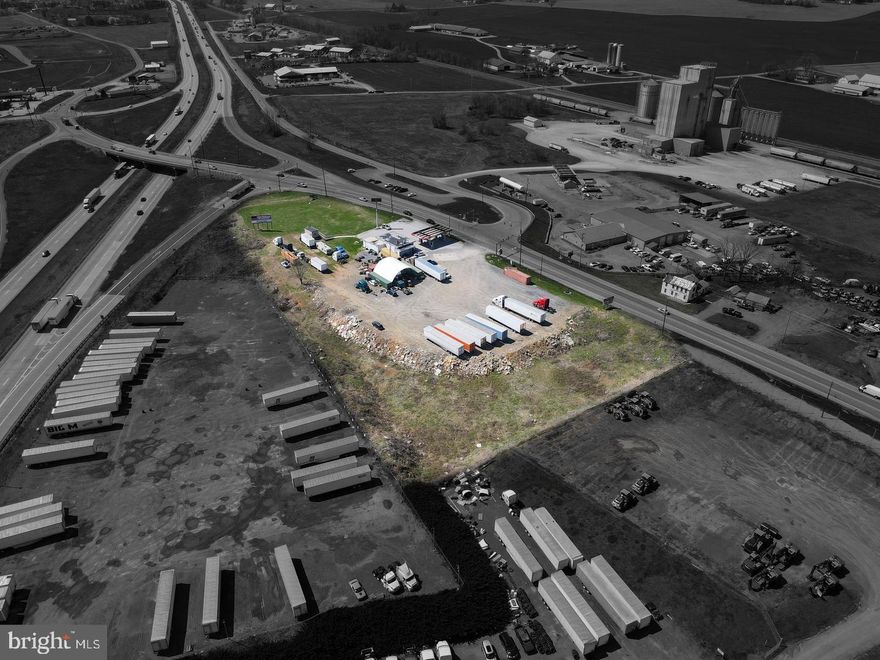 Prime Real Estate along Interstate 81 in the warehouse corridor, With over 100,000 daily drive bys, Industrial/commercial land surrounded by warehouses. Constantly growing industrial area. 3.99 Total Acres off of Interstate 81, Southbound exit 24. Includes two parcels (tax ID 21-0N14.-084.-000000 and 21-0N14.-081B-000000) Currently in use as a gas station with 5 pumps, convenience store, truck parking/stop. Two entrances/exits, one with a stop light. 4 Underground tanks current use as diesel, gas, and off road fuel