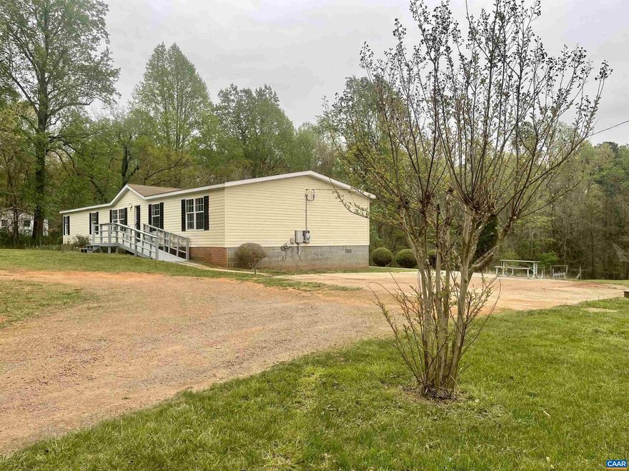 Come see 2817 Dawson Ln, a roomy residence nestled on a sprawling 3+ acre parcel of land! This home boasts 4 bedrooms, 2 full bathrooms, a living room, dining room, family room, and a den. The kitchen, open to the living area, features oak cabinets, a pantry closet, Formica countertops, and tiled flooring. The primary bedroom includes a walk-in closet, new carpeting, ample space, and a ceiling fan. All other bedrooms are also newly carpeted and equipped with ceiling lights. Abundant natural light floods the living room, adorned with hardwood flooring, while the family room offers a cozy fireplace and matching hardwood floors. Out back, a generously-sized, recently renovated deck awaits, perfect for savoring morning coffee or basking in sunny days. With so much to offer, this home demands your immediate attention! Schedule your viewing today!,Formica Counter,Oak Cabinets,Fireplace in Living Room