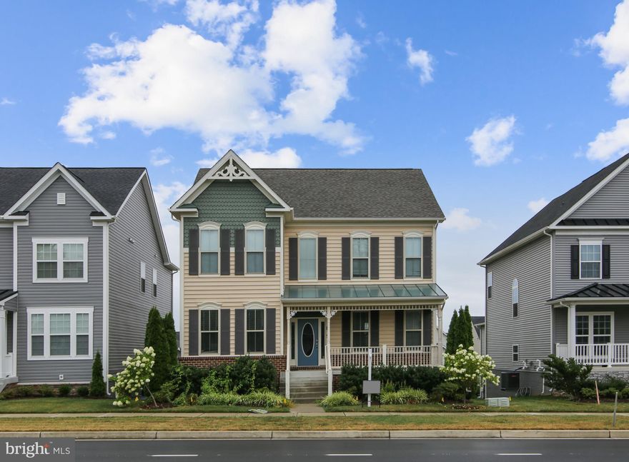 Welcome home to this beautiful house located on Brunswick Crossing! This updated popular Essex model by quality builder Advantage Homes is fully finished with three levels. The front of the house has a welcoming porch where you can take in the beautiful mountain vistas. Wonderful floorplan throughout with both formal living and dining rooms as well as a large family room with gas fireplace and morning room off the spacious gourmet kitchen with plenty of space for a casual dining table and more. There is a gorgeous new TREX deck off the morning room, engineered bamboo hardwood floors on the entire main level as well as stairs going up and the landing upstairs. The attached oversized 2-car garage is practically located off the kitchen. On the upper level, there's a spacious owner's suite with a huge bathroom and his and her walk-in closets. There are three more additional spacious bedrooms, a hall bath and a laundry room complete the upper level. The fully-finished basement is above ground letting a lot of extra light in. Besides the large rec room there is a full bath and two more finished rooms for your enjoyment. Come see what Brunswick Crossing is all about! Gorgeous amenities such as swimming pool, tennis, soccer field, walking trails, beach volley, community center, garden plots, dog park and more! Don't delay seeing this beautiful home before it's gone.