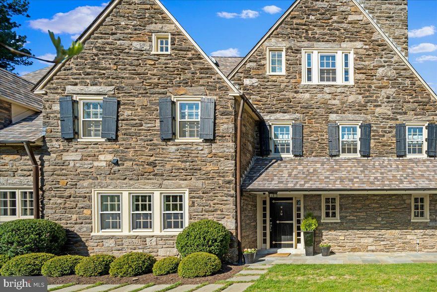 Welcome to 215 West Gravers Lane ideally located in the heart of Chestnut Hill! We are excited to offer this truly spectacular property, built circa 1925, in a classic Philadelphia style. Move right in to this magnificent, stone residence, beautifully sited on .43 acres, offering 5500 square feet, 5Br/4.2Ba. The first floor features a brightly lit, gracious floor plan with exquisite architectural details and moldings, meticulously and lovingly maintained, with a fresh, modern design. The gracious center hall with handsome staircase is a warm welcome for family and friends. Dining room to the left and formal living with fireplace and sunroom to the right. The fabulous gourmet eat-in kitchen is a knockout; featuring Viking, SubZero and Bosch appliances, custom cabinetry, marble countertops, butler’s pantry with wine refrigerator and office space. Cool mudroom with exposed schist and exits to driveway and garage completes an ideal setup for every day living. Upstairs, in addition to a cozy well outfitted primary suite with marble bath, two floors of bedrooms, baths, office, music room and comfortable living spaces. Finished lower level that you dream about with game/media and exercise area. Outside, two terraces for dining, grilling and casual entertaining. Mature landscape plan installed by Laurel Hill Gardens with specimen plantings and trees. This is a wonderful opportunity to experience an exceptional lifestyle, in a private setting, just a short walk to the Chestnut Hill Village, schools, a world-class sports facility, Pastorious Park and the Wissahickon Valley trails. Quick commute to Center City and 90 minutes to Manhattan.