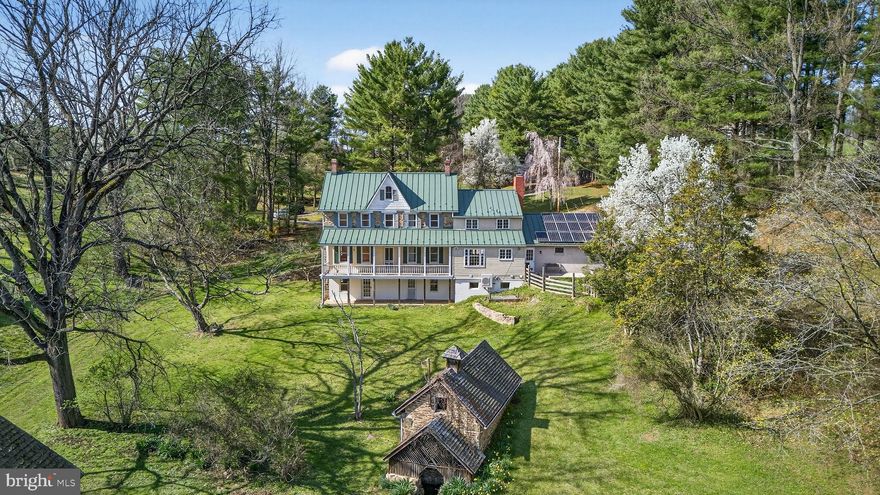 This gorgeous stone farmhouse circa 1841 is rich in history and sits on 71 acres in the beautiful Hereford Zone.  Character abounds in the finishes: covered porches, standing seam roof, stone exterior, wide plank flooring and custom millwork. The property has been home to horses, cows, chickens, donkeys, goats as well as pear, apple, cherry and peach trees.  The charming stone spring house provides water supply to many of the 6 pastures which also host a 40x60 pole barn, corn crib and run-in shed. Looking for a 5th bedroom? Check out the upper upper level or the lower level with full bathroom and wet bar.   Now's the chance to own a piece of history!