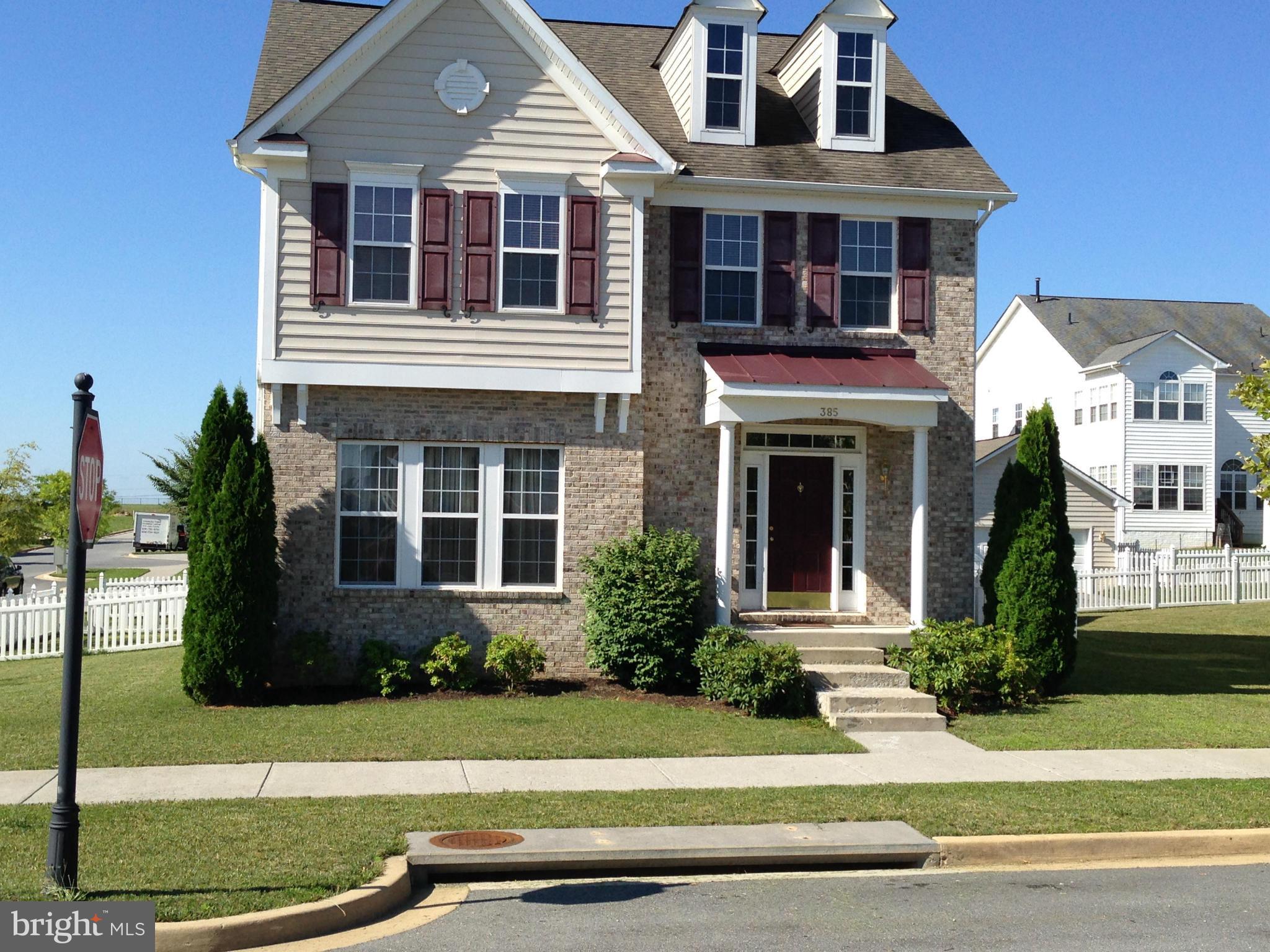 Move in ready. This gorgeous 4 bedroom house 2.5 baths, full unfinished basement, newer carpeting, and is located on a corner lot. Has sitting room, living room with gas fireplace,dining rm, kitchen w/island, sep. laundry rm, hardwood flrs in main level, fenced back yard, two car garage behind house w/auto openers.