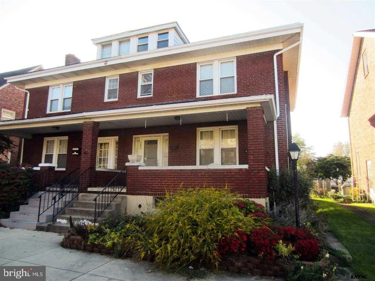 Solid brick semi-attached 3BR 2FB in move-in condition. EIK w/appls opens to concrete patio. Formal DR w/wood fl. Lg LR w/WB Fireplace (it has never been used by seller, but did have chimney cleaned in '04). Updates incl: new heat system 2011, Elec & added 2 lines, insulation added in attic, & ceiling vent in bathrm. Large 2-3 car gar w/new doors.