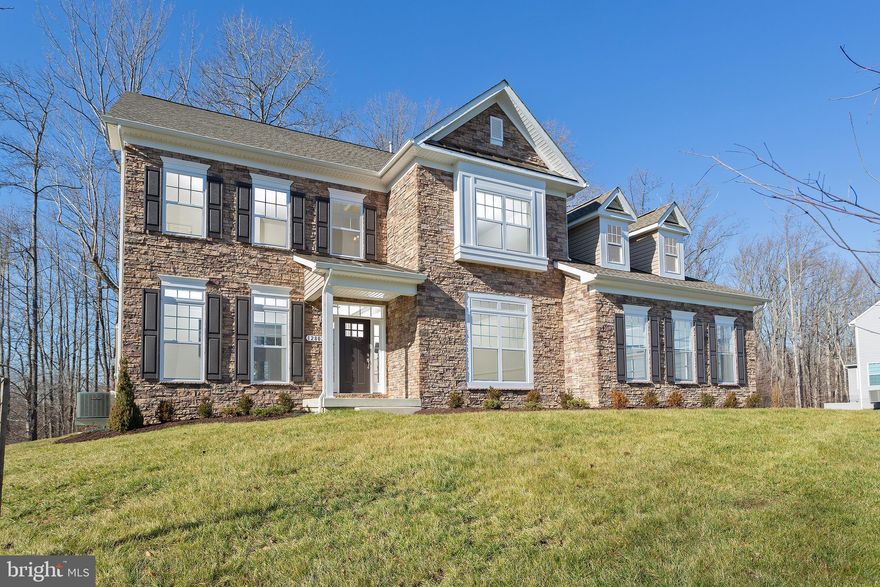 This stunning award-winning home is one of our most popular designs It accommodates a lot of lifestyles.  The open floor plan creates an easy welcoming feel with its formal and informal dining areas.The gourmet kitchen has an infinity island perfect for entertaining with a huge walk-in pantry and tons of storage space.This home also features a main level multi-generation space with a full bathroom. This home has a 2 level family room with a  detailed coffered ceiling treatment which draws the eye up in the great room.  The master suite offers a luxurious walk-in shower, free-standing soaking tub, double vanities, and extremely generous closet space .  A MUST SEE HOME THE PICTURES SAY IT ALL