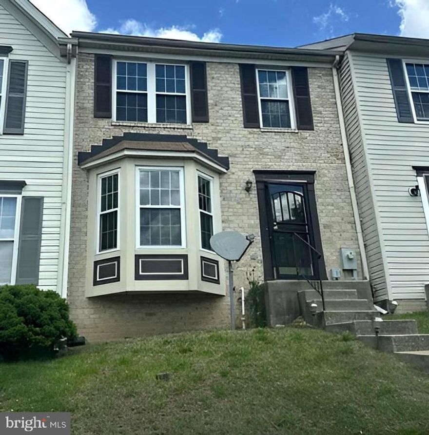 This Colonial style townhouse combines solid construction with convenient neighborhood access. Brick exteriors provide classic curb appeal and durability, while the finished basement expands living potential beyond the main floors.

The home features multiple bathrooms throughout. A large basement great room with fireplace creates flexible space for recreation, relaxation, or additional living needs. The lower level transforms into a functional extension of the home with its completed design. Brand new rear slider to deck installed.

Location highlights make daily errands and recreation accessible. The property sits near Bear Creek Park, offering outdoor recreation Nearby. Proximity to Dundalk Elementary School serves residents with school-age household members. Shopping convenience is within reach—Logan Village Shopping Center is nearby, and Merritt Park Shopping Center is just minutes away. Heritage Park provides additional green space in the immediate area.

This townhouse delivers practical value in an established Dundalk neighborhood with parks, schools, and retail all within easy reach.