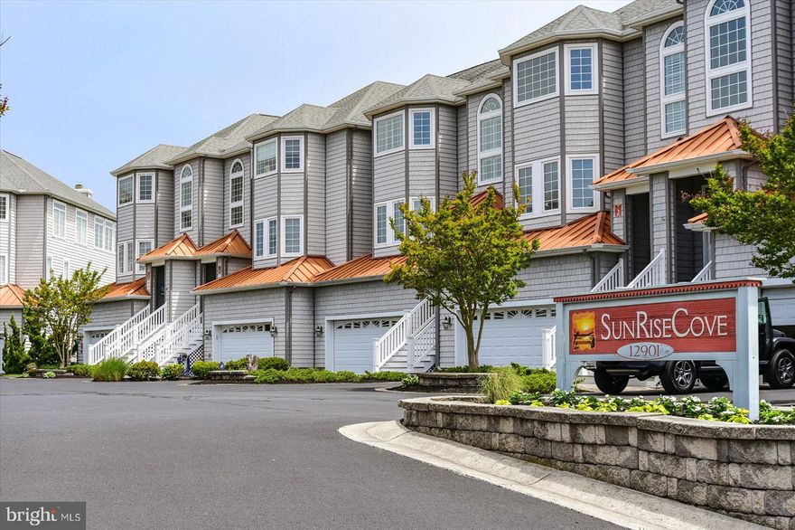 Welcome to Sunrise Cove, a premier waterfront townhouse that offers breathtaking views of the Bay and the Ocean City skyline. Located just steps away from two marinas, this expansive 4-bedroom, 3.5-bath home provides nearly 4,000 sq ft of living space, offering a perfect blend of luxury and convenience. With its spacious floor plan, this home is designed for both comfort and entertaining.

The property features a private elevator that services all three floors, making it easy to access each level. The main living area has an open concept layout, with a large kitchen equipped with solid surface countertops, a breakfast nook, and a bar. The expansive living and dining areas are accented with vaulted ceilings and a cozy gas fireplace, perfect for family gatherings. On the first floor, you'll find a self-contained living space with a kitchenette, living room, bedroom, and full bath, ideal for guests or extended family.

On the second floor, the master suite is a true retreat, offering a walk-in closet, dual vanities, a separate tub, and shower. Two additional spacious bedrooms share a full bath on this level. The third floor is designed for entertaining, featuring an open floor plan with large windows that flood the space with natural light and provide stunning water views. A wet bar adds to the appeal of this level, making it perfect for hosting friends and family.

This home also offers two large water-view balconies, including one on the third floor that is perfect for soaking up the sun while taking in panoramic views of the bay and inlet. The master suite has its own private balcony, adding another 1,000 sq ft of outdoor living space.

The property includes a two-car garage, ideal for storing kayaks, bikes, or other outdoor equipment. For boating enthusiasts, there may be dockage available to rent at Ocean City Fishing Center or Sunset Marina, giving you easy access to the water.

Located in the heart of West Ocean City, this home is just minutes from the beach, marinas, restaurants, and shops, making it the perfect coastal retreat. Buyers are encouraged to verify square footage, school information, and all other property details. Schedule your private tour today to experience this one-of-a-kind waterfront home!