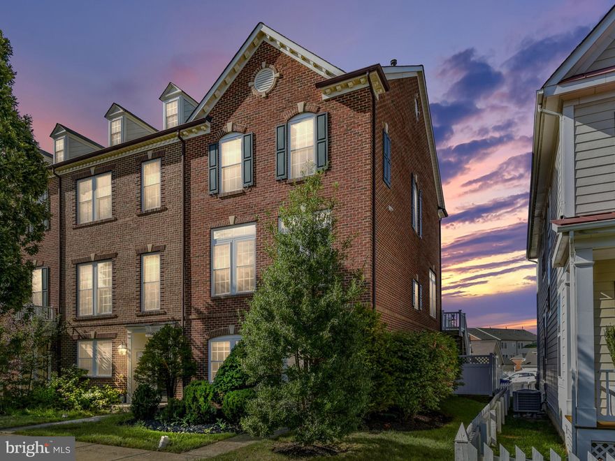 This large, light-filled, end-unit townhome is a quick walk to some great Villages of Urbana amenities: walk to preschool, Centerville Elementary, Urbana Middle/High, several playgrounds and the new resort-style swimming pool and work-out facility! Featuring 3 finished levels of living--including a lower level bedroom, full bath, and recreational/living area. Great gourmet kitchen with stainless steel appliances, a spacious island, and bonus sitting area because of a 3-level 8-foot bump-out! Enjoy the light-filled living room with fireplace. Spacious master bedroom suite with a dual sink vanity--plus two large walk-in closets. Walk-out from the lower level in your private fenced yard with patio!! Enjoy barbequing and morning coffee on your spacious deck. Detached 2-car garage with alley access. Gate in the fence for easy alley access. Play sports or socialize on the nearby green space. This townhome has it all! Don't miss this fantastic home!