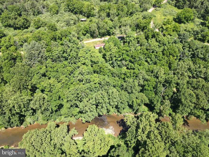 River property!! Check out this improved 2.8 acre lot that sits on the North River in Hampshire County. This lot has some trailers and debris on it that will be staying. Lot appears to be improved with well, septic, and electric. Clean up the lot and have a wonderful weekend place on the river! Not sure if it'll last to long!