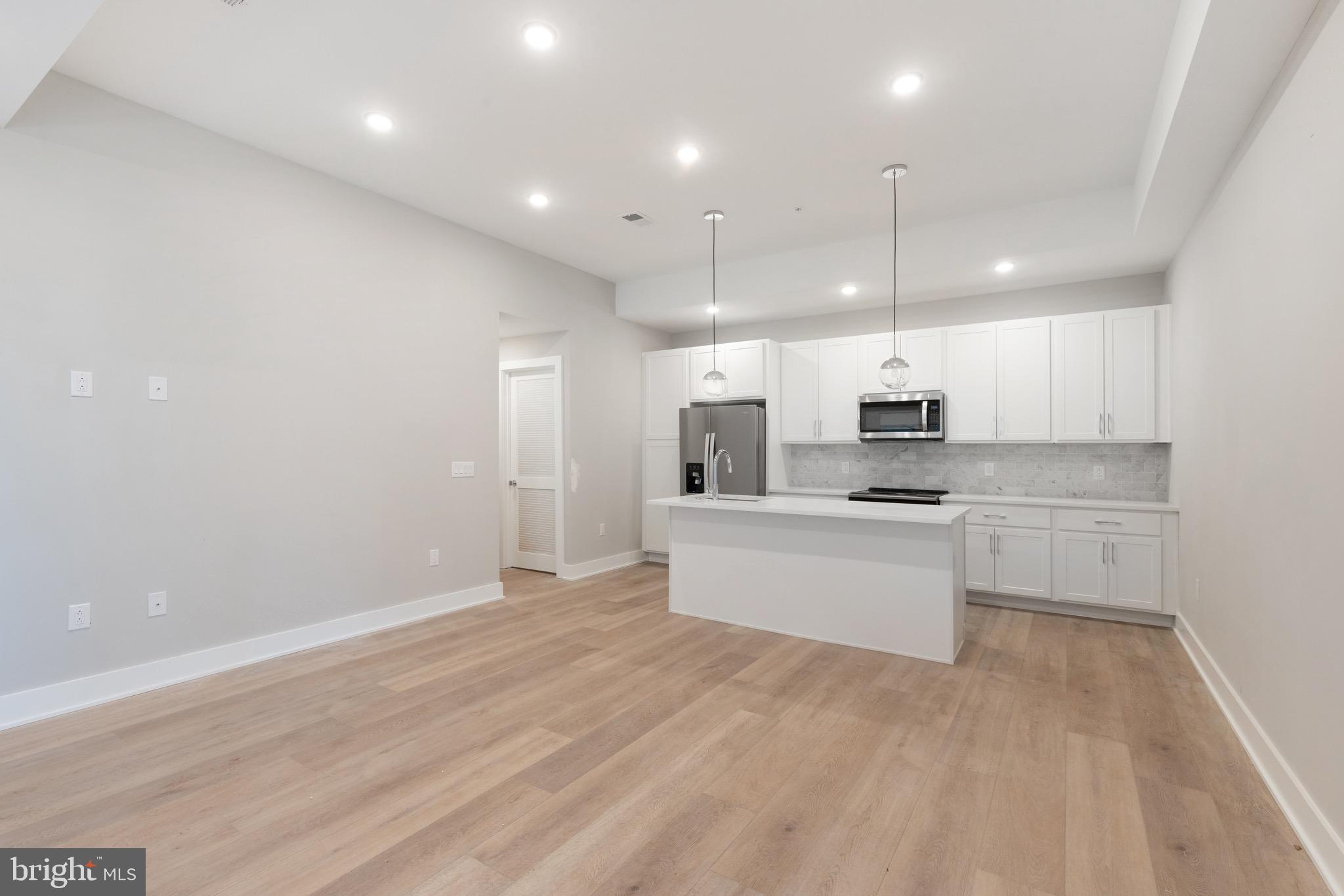 Welcome to Washington Court - a luxury 34-unit community located in the heart of Philadelphia's historic Germantown neighborhood. Residents will enjoy a host of benefits and amenities including on-site parking, Latch digital entry, full service elevator, furnished communal roofdeck, and a complimentary storage unit on the basement level.
Each unit is highlighted by stunning Quartz countertops throughout, upgraded stainless steel appliance package, 42-inch white shaker cabinetry, luxury tile selections, and custom California closet systems.
Our 06 layout, one of the most popular floor plans in the buildings, offers a spacious island and oversized living area in addition to some of the most incredible natural light exposure the building has to offer.
Located near a multitude of transit options, residents will enjoy ultimate convenience in their daily commute regardless of where they must go!
LEASING PROMOTION: ONE FREE MONTH ON A 12 MONTH LEASE + REDUCED MOVE IN FEES. Advertised price is reflective of 1 month free amoritized as monthly credit on a 12mo lease. Lease contract will read higher than ad price. Prospects will only be required to pay 2 months rent (first + security) to move in.