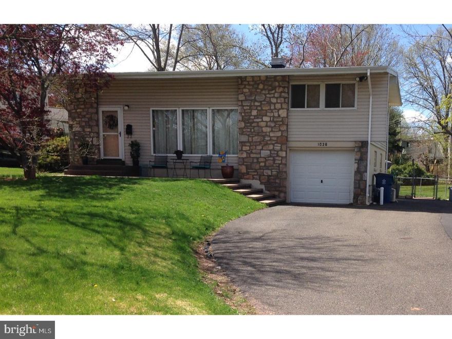Welcome home to this wonderfully unique  split-level in Inglewood Gardens! Your arrival is greeted with a spacious driveway front steps that lead you to a large front paver patio and entrance way. Enter your new home and immediately be impressed the terrific great room with vaulted ceiling, exposed beams, upgraded flooring and light pouring in through a large wall of windows. The kitchen includes cherry cabinets with under cabinet lighting, high grade granite countertops,  appliances including gas range, dishwasher, refrigerator/freezer, glass tile backsplash, and recessed ceiling lighting. Pendant lights illuminate an extra large preparation area with even more cabinets for family gatherings. The sliding door leads to the huge deck that continues onto an extended oversized paver patio and above ground pool. The lower level family room has  porcelain tile floor with a walkout to the rear oversized paver patio. and pool. A laundry room, powder room and garage complete this lower level. Upstairs are three good sized bedrooms with cherry hardwood floors plus the remodeled hall bath . Other upgrades include new front door, and bonus space in the back yard. Great fenced back yard with huge deck. This is a terrific setting in a desirable neighborhood within easy walking or driving distance to schools, shopping, downtown Lansdale, and major commuting routes.