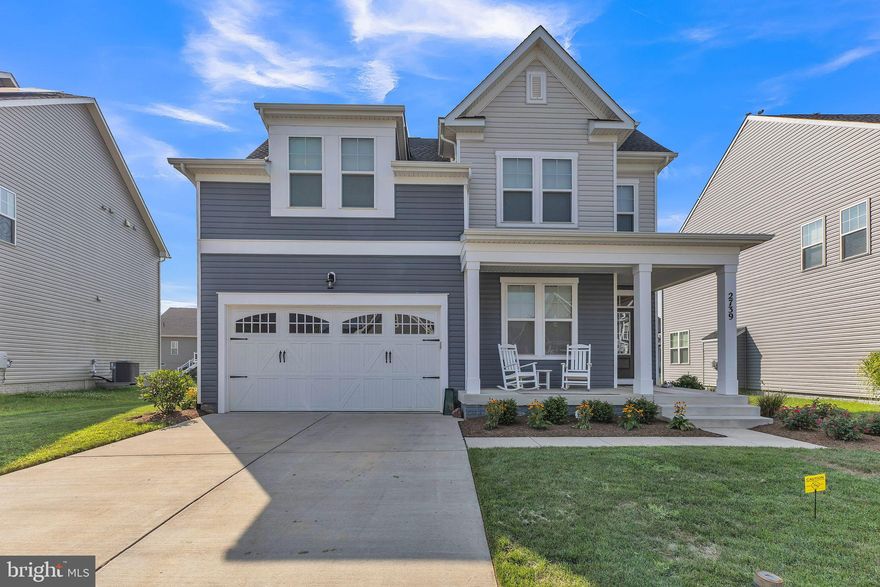 Discover this rare gem in the highly sought-after Two Rivers community! This home features 4 bedrooms, 3.5 bathrooms, and over 3,900 square feet of thoughtfully designed space, seamlessly blending comfort and elegance. The large fenced lot provides ample room for pets and outdoor entertaining. The open-concept main level boasts luxury vinyl plank flooring, a gas fireplace, and custom built-ins. The chef’s kitchen is equipped with quartz counter-tops, soft-close cabinetry, stainless steel appliances, and an over-sized island, making it perfect for entertaining guests. The spacious primary suite on the main floor includes a spa-inspired bathroom with a soaking tub and a walk-in shower. The fully finished basement adds a guest suite, a media room, and bonus space, along with a French drain for added convenience. All outdoor drainage is buried, ensuring a clean aesthetic. Underground lawn sprinkler system to ensure care-free maintenance of irrigation. Energy efficiency is enhanced by the inclusion of solar panels. The homeowners association (HOA) provides access to a clubhouse, pool, and gym. Located on a quiet street with easy access to Baltimore, DC, Annapolis and Fort Meade, this home is a must-see!