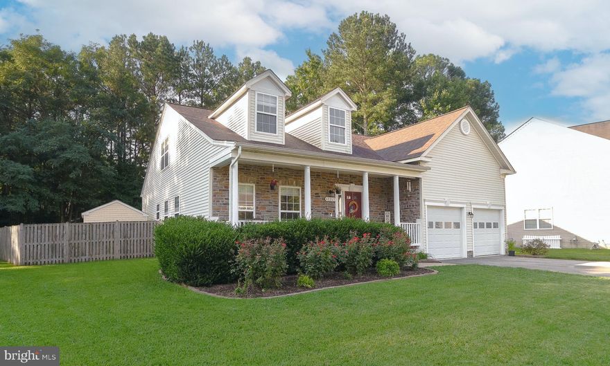 Welcome to your dream Cape Cod home, perfectly nestled within a charming coastal community off the back gate to Patuxent Naval Air Station.  
Step inside this 4-bedroom, 3-full bath residence and be greeted by the warmth of new flooring that flows seamlessly throughout the main living areas, creating a sense of inviting coziness. The heart of the home is the captivating stone fireplace, which will become the focal point for family gatherings.
The thoughtfully designed and well-appointed kitchen stands ready to cater to your culinary desires. With modern appliances and an open layout to the living area, it effortlessly accommodates everyday cooking and entertaining endeavors.
The main level boasts two bedrooms: a luxurious master bedroom offering a private retreat with its own en-suite bathroom. The second bedroom (or office) also has its own full bathroom. The remaining two bedrooms on the upper level ensure that family and guests have their own comfortable haven to rest and rejuvenate.
Outside, the fenced yard provides a secure space for children to play freely and pets to roam safely. 
A brand-new roof (2022) and newer HVAC (2018) ensures peace of mind reflecting the care and attention dedicated to this property. 
Location is key. Nestled within a tranquil neighborhood, it offers the rare advantage of being within walking distance of the Chesapeake Bay shoreline with a direct path from the backyard.  Perfect for strolling along the beach, watching the sunrise, or indulging in various water activities right from your doorstep.