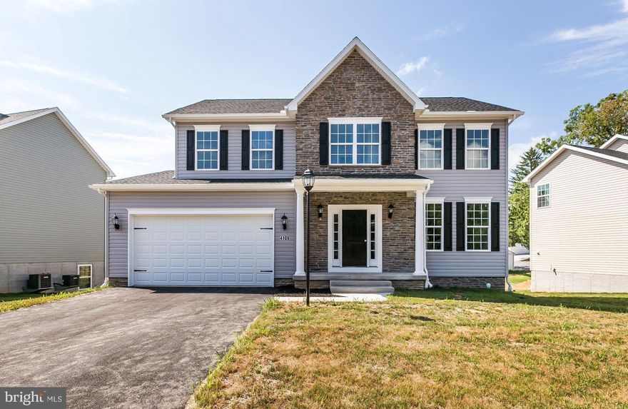 IMMEDIATE DELIVERY!! CHECK GREAT BUILDER INCENTIVE: Charming Main St. community in Hampstead. Homes include public utilities,Nat Gas,level basement walkouts and a future common area. This lovely home includes a large, upgraded kitchen with table space and adjoins the family room. There are 4 large upper level bedrooms, a 2nd floor laundry and a large owners' suite with a great bath.