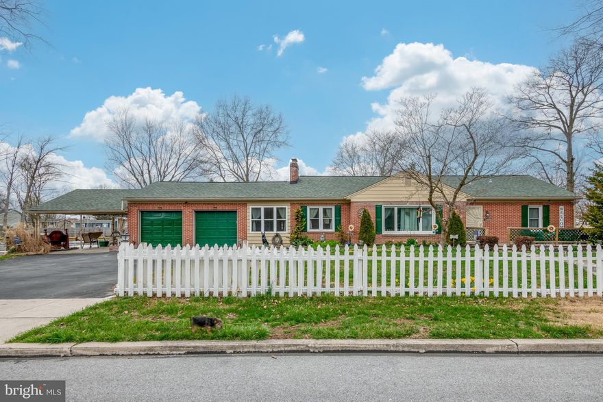 Beautiful home!! These 3 bedrooms, 2 full bath and 1 half bath, 2 car attached garage situated on over an acre of land RANCHER is stunning, both inside and out. When you walk in the front door, there is a large open living space. This could be a great opportunity for a large formal living room, or it could be divided into a living room and a dining room. These two spaces have beautiful hardwood flooring, ceiling fans, and a pellet stove. Next to this space is the kitchen. The kitchen is absolutely BEAUTIFUL, with lots of natural light from the sky light, all updated, white cabinets, complete with ceramic tile flooring, granite counter tops, a bar area, stainless steel appliances to include a gas oven, wine rack, double sink, and beautiful cabinetry. There is also a close pantry space which provides even more storage. There are 3 bedrooms all with hardwood flooring and recessed lights. Main Suite has full bathroom with a double vanity and access to an oversized attic with so much possibility!  There are 2 full bathrooms on the first floor. There is a gorgeous breezeway room with laundry, tiled floor, heating (no a/c), and has access to the backyard where you can enjoy the beautiful hot tub as well as access to the 2-car detached garage! The basement has a French drain system and a half bathroom. There is a beautiful pond next to the home, which is stunning to look at out the morning room! The electric is run to the sheds, and to other side of the stream.  Home has SO MANY new upgrades, there is a list with dates in documents section! Truly a beautiful property and home!  Call Today to schedule your showing!