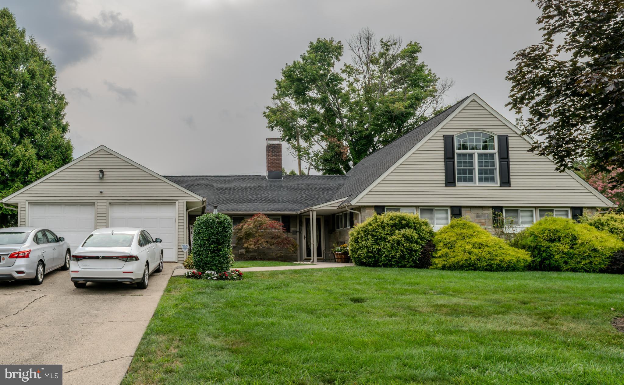 Welcome home! Step into this cozy, well-maintained country clubber home in the Forsythia Gate section of Levittown, which is part of the desirable Neshaminy School District. This house has many possibilities, offering multiple living spaces and a property built for entertaining.
This home has three spacious bedrooms on the first floor and two additional bedrooms upstairs. There is a full bathroom in the main hallway downstairs and a second full bath attached to the master bedroom, both of which are fully updated. Two areas could function as living rooms as well as a spacious dining room. There is new luxury laminate flooring throughout the kitchen, living room, and great room. There is a laundry room off the great room, and beyond that, there is a walk-in pantry for extra storage. There is an incredible amount of storage space as this home features large closets throughout, a 2-car garage, and a massive attic space. A shed is also included in the backyard.
The screened-in back porch is a lovely place to enjoy morning coffee or host BBQs and pool parties. The backyard includes a paved section with a basketball hoop and an above-ground pool that has been meticulously maintained. This yard is fenced in with mature landscaping that adds warmth and privacy. The backyard is a great space to relax and enjoy warmer weather. The neighborhood is quiet and peaceful, and there are 2 parks with playgrounds within walking or biking distance from the house. The downstairs central AC system and the oil burner were replaced in 2023, and a brand-new roof was installed this year. Upgraded 200-amp electrical service, including a separate circuit breaker box with a generator hookup to provide partial power during power outages. Come check out this beautiful home that truly has it all.