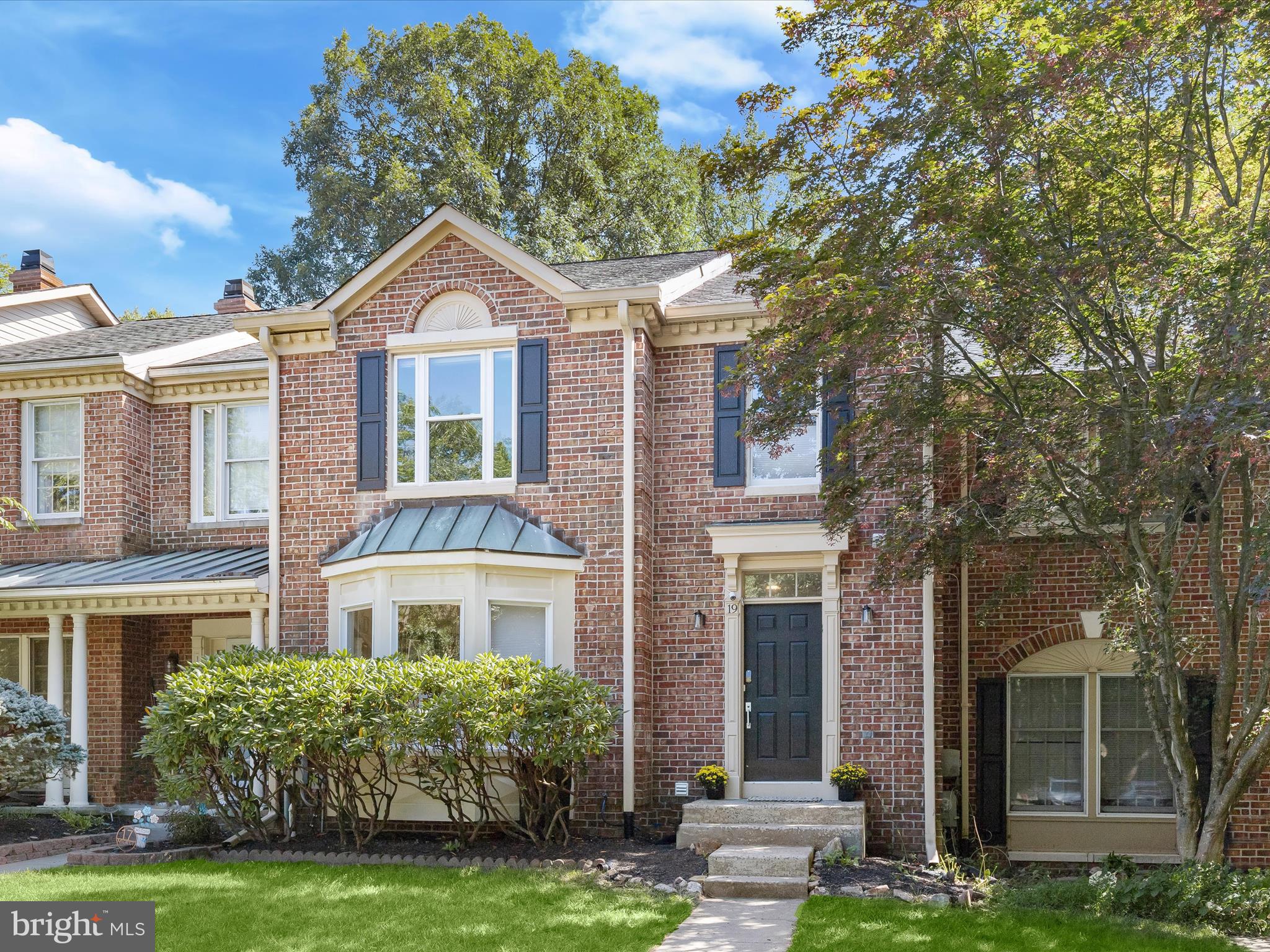 This beautifully updated brick and vinyl siding home offers the perfect blend of comfort, style, and convenience. Step inside to a welcoming foyer featuring gorgeous hardwood floors and crown molding that flow seamlessly into the living and dining areas. The spacious living room boasts elegant crown molding, rich hardwoods, and French doors that open to a freshly painted deck, ideal for entertaining or relaxing outdoors. The dining room provides a natural connection to the kitchen for effortless hosting. The updated kitchen is a true highlight, showcasing quartz countertops, a decorative backsplash, shaker-style cabinetry with soft-close drawers, a pantry, a dining area, and sleek appliances with electric cooking. Upstairs, the luxurious primary suite impresses with a vaulted ceiling, hardwood flooring, abundant natural light, a walk-in closet, and a spa-inspired en-suite bath with a double vanity, soaking tub, and walk-in shower. Two additional bedrooms and a stylish hall bath complete the upper-level retreat. The fully finished lower level expands the living space with luxury vinyl plank flooring, a full bath, and versatile areas perfect for an office, recreation room, or game space. Enjoy walk-out access to the backyard along with secure storage. Recent updates include the kitchen, flooring, primary bath, appliances, and deck painting, ensuring peace of mind for years to come. Conveniently located near Quarry Lake, shopping, dining, and entertainment, with easy access to I-695 and I-83 for travel to Baltimore, Washington, D.C., and beyond, this home offers both lifestyle and location in one.