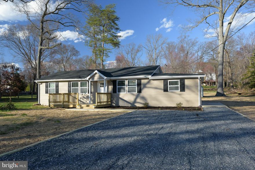 One level living at it's finest - Renovated from top to bottom! Located on an extra large lot (0.62 acre) with room the breathe! Large eat-in KIT w/ ceramic tile, granite counters, new cabinets, & SS apps! NEW roof, flooring, siding, windows, & deck! Gravel driveway can accommodate multiple vehicles! Chelsea Beach features boat ramp, playground & beach! Move right in!