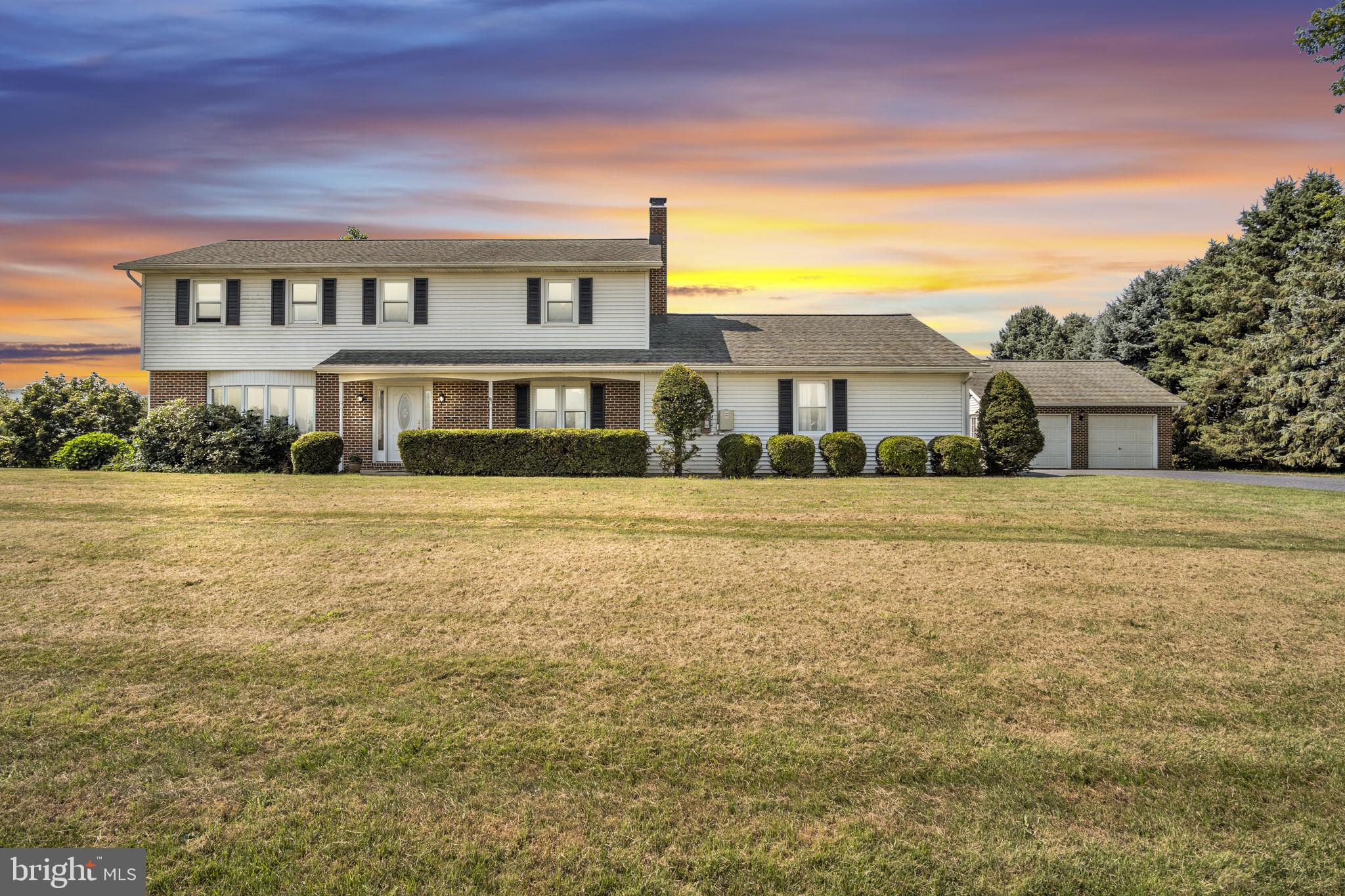 Welcome to your future home, a stunning 4-bedroom gem nestled in the Cumberland Valley School District in Monroe Township. This isn't just a house; it's a new home waiting for you!
Step inside and prepare to be wowed by the brand-new kitchen, a chef's dream come true. You'll love preparing meals while gazing out of the huge windows that frame breathtaking, unobstructed farmland and mountain views. Imagine sipping your morning coffee and watching the sunrise—this is the kind of tranquility you've been searching for.
The main level offers plenty of space for everyone, including a cozy living room and a family room complete with a warm fireplace, perfect for those chilly nights. Need a place to unwind? The bright sunroom is the ideal spot to curl up with a good book or simply soak in the natural light. The massive laundry room makes chores a breeze, and you'll find plenty of storage throughout.
Upstairs, the luxurious master suite is your personal retreat. The newly renovated bathroom feels like a spa, and the walk-in closet has space for all your favorite things. Best of all, your private balcony offers the same incredible mountain and farmland views, making it the perfect spot for a quiet moment at the end of the day.
Outside, the fun continues! The expansive yard and large patio space are an entertainer's paradise, ready for BBQs, yard games, and enjoying those famous Pennsylvania sunsets. You'll have plenty of room for all your vehicles and toys with an attached 2-car garage and a fantastic additional detached 2-car garage.
This home truly has it all—location, views, and all the modern amenities you could ask for. What are you waiting for? Schedule a tour today and come see the magic for yourself!