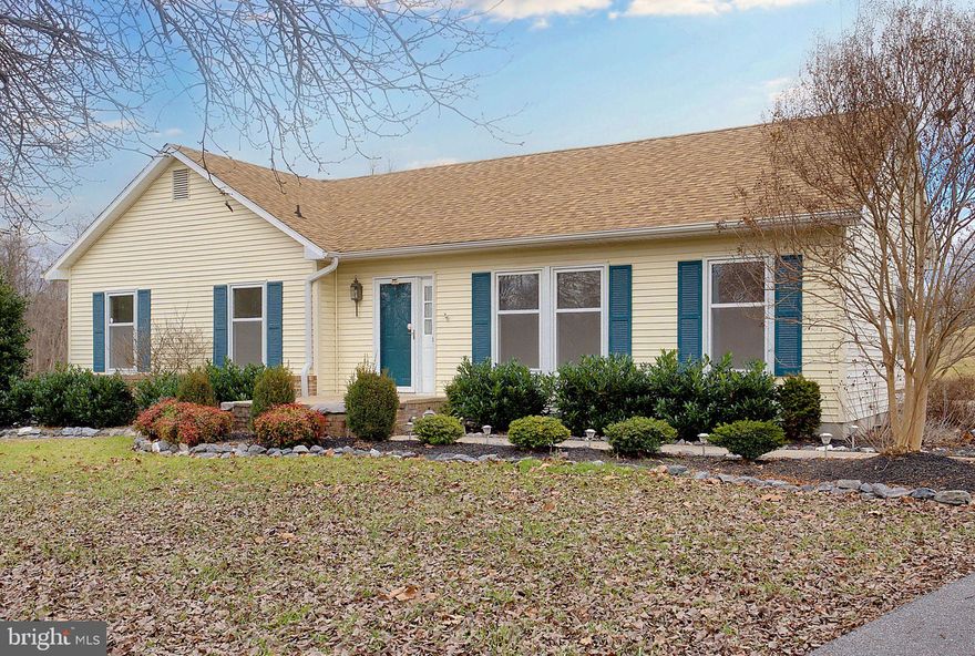 Horses allowed! Charming rancher nestled on nearly 3 acres with plenty of curb appeal! Secluded at the end of the drive, this home boasts a sense of tranquility with mature trees enhancing its semi-private nature. Recently upgraded with brand new carpet and a fresh coat of paint, the interior features large rooms throughout including the living, family and dining rooms. Primary bedroom with double closets and its own en suite bathroom with built-ins. Enjoy seamless entertaining on the 15 x 12 deck with a remote-controlled sunsetter awning just off the family room and kitchen. Experience the serenity of country living while being a mere 5 minutes away from dining and shopping, and just a short 10-minute drive from the WV/VA line. Side yard is fenced and perfect for a dog-run. Shed included. High speed internet available!