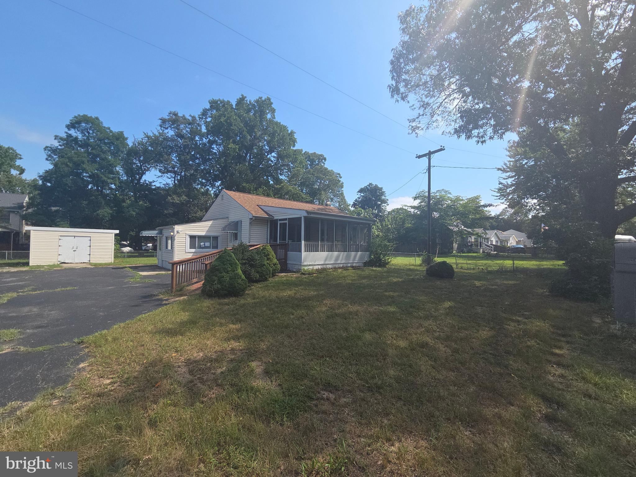 This is a Fannie Mae Reverse Mortgage Foreclosure. This home offers extensive parking in the driveway and fencing. The main level has two bedrooms, bath, kitchen and living room. There is a side porch with basement access. The enclosed front porch has an access ramp. The lower level has interior stairs, a large rec room, storage, additional possible third bedroom and utility area. The lot is large and flat.