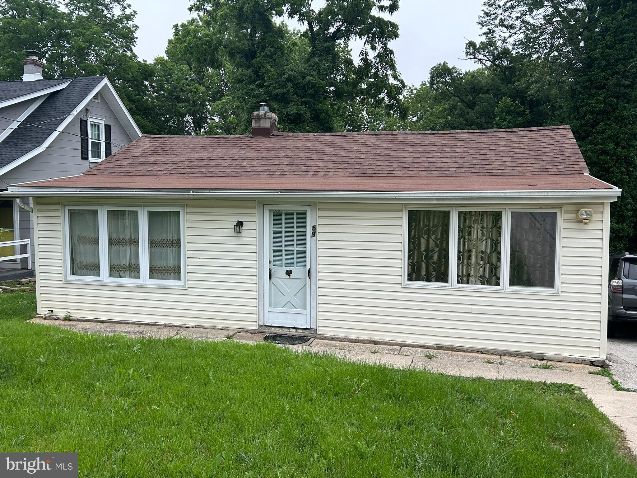 Here is your opportunity to lease a home in Newtown Square under $2500! No HOA fees, lots of yard space and instant equity. The yard is 50x300 and very private. Enter the front door into the living room and take note of the beautfiul hardwood floors, wood fireplace that can be converted to propane and the endless amount of sunlight that beams through. The space flows into the dining room and kitchen - this space is equipped with stone floors to start. The kitchen has shaker style white cabinets, butcherblock countertops, stainless steel appliances and french doors to the large rear deck. The washer and dryer are located in the kitchen for convenience - you may move it back into the basement and turn this space into a pantry. The dining room is quaint and offers a space for entertaining with a nice flow. There are two bedrooms in this home complete with ample closet space, vinyl floors, lots of natural light beaming through and ceiling fans. The bathroom contains a tile stall shower and a pedastal sink. The basement is unfinished and a blank slate, a great space for storage. The backyard is private and large. The shed can house multiple lawn equipement and the driveway can park up to 10 cars. The deck is such a lovely place to sit and enjoy your morning coffee or have dinner in the evenings overlooking natures best.This home is located within Marple Newtown School District. New roof was installed in 2021, HVAC 2021, Propane on the front lawn is leased. Located within close proximity to major roadways, schools, shopping centers and much more.