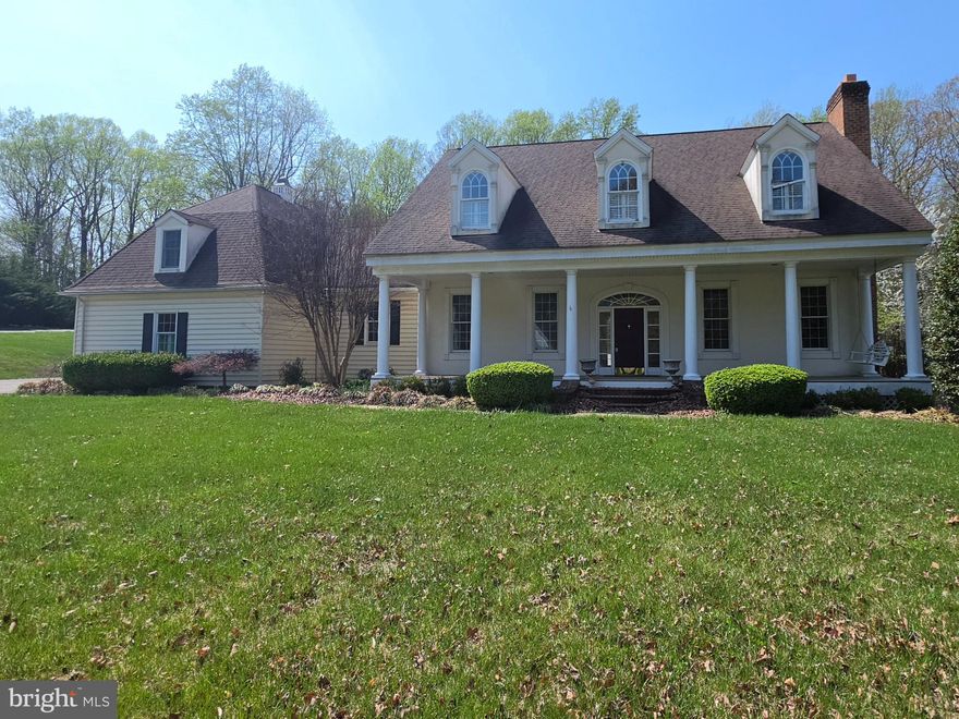 Nestled on 2 private acres in Annapolis, this expansive custom-built Cape Cod offers incredible potential for those looking to create their dream home. Featuring a spacious layout, the home includes a main-level primary suite complete with a large walk-in closet, private water closet, and a generous en-suite bath.

The inviting family room provides the perfect gathering space and opens to a beautiful stone patio accessible from both the family room and primary bedroom—ideal for indoor-outdoor living. Multiple fireplaces throughout the home, including one in the full-footprint unfinished basement, add warmth and character while offering endless possibilities for future expansion.

While the property does require some updates and is being sold as-is, its impressive size, desirable location, and solid custom construction make it a rare opportunity to invest in a truly special home.