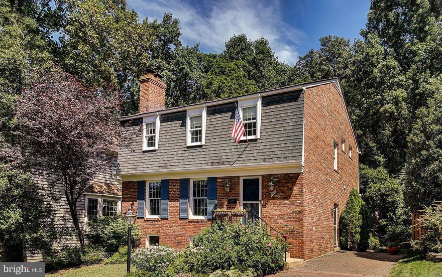 Charming very well maintained all brick Colonial located in a popular Kings Manor subdivision. Numerous upgrades, hardwood floors throughout, 2 fireplaces, spacious deck, brick patio & a very private yard backing onto woods. Conveniently located near Tysons Corner, Metro, Airports, Langley High School Pyramid.