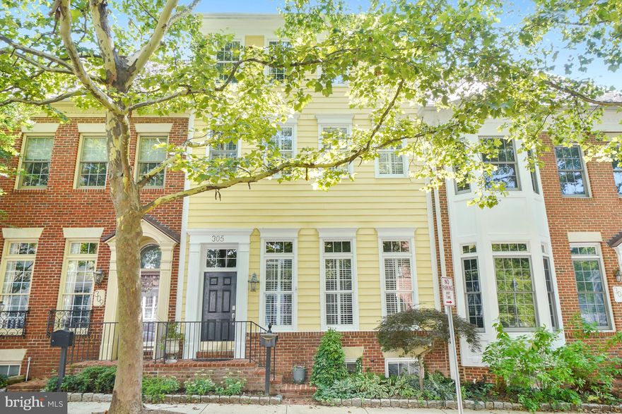 Welcome to 305 Hart Road! This beautifully appointed townhome is located in the vibrant Kentland's community. The home offers over 3,900 square feet of well-designed living space across four finished levels. This spacious residence features 4 bedrooms, 3.5 bathrooms, and an attached two-car garage, blending comfort, style, and functionality.

Step inside to a welcoming entry with soaring ceilings, abundant natural light from oversized windows, and gleaming wood floors that flow throughout the main level. The formal living and dining rooms provide elegant spaces for entertaining, highlighted by a stunning chandelier and ample room for gatherings. The open-concept layout seamlessly connects to the family room, complete with a cozy gas fireplace and direct access to a private outdoor patio.

The upgraded kitchen features stainless steel appliances including a gas range, crisp white cabinetry, and a stylish backsplash. Adjacent to the kitchen is a versatile space with durable wood-look tile flooring, beam ceiling detail, and wall-to-wall windows overlooking the patio. The space is perfect for a casual dining area, sunroom, or home office. A convenient powder room and garage access complete the main level.

Upstairs, the primary suite offers a true retreat with a spacious sitting area, two walk-in closets, and a luxurious ensuite bath featuring a double vanity, soaking tub, walk-in glass and tile shower, and elegant herringbone flooring. This level also includes a second bedroom that works for a home office or guest space and there is convenient bedroom-level laundry space.

The top floor provides a private oasis with a large recreation or family room boasting vaulted ceilings, along with two additional bedrooms and a beautifully updated full bath. The bathroom showcases a modern dual sink vanity, a walk-in glass and tile shower with a rolling door, and eye-catching mosaic tile flooring.

The fully finished lower level expands your living space even further, offering a large rec room with LVP flooring, a bonus room, and a full bath with shiplap accents and a walk-in glass and tile shower.

Ideally located just one street from Kentland's Main Street, this home offers exceptional walkability to Kentland's’ shops, restaurants, and entertainment venues. With easy access to major commuter routes and transit, this is a rare opportunity to enjoy space, style, and convenience in one of the area’s most desirable communities. Schedule your showing today!