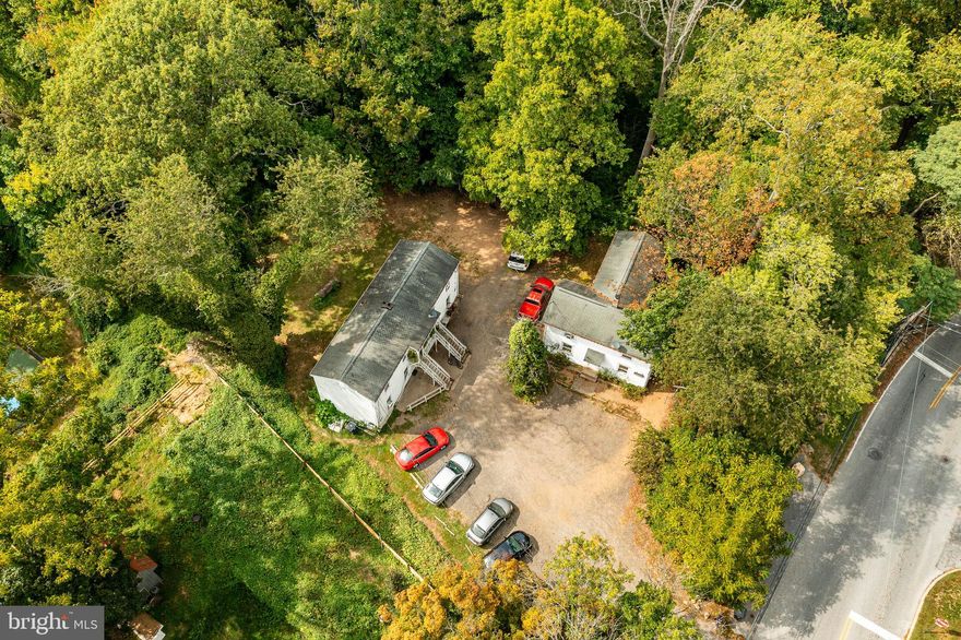 INVESTOR ALERT! The possibilities are endless with this 6 unit rental property in an incredible location. Two separate buildings, the front building offering 2 apartments and the rear building offering 4 apartments. 5 out of 6 apartments are currently rented with MTM leases. Ample parking. Located on a 1.3 acre parcel adjacent to the entrance to Anson B Nixon Park as well as the new YMCA Pickleball Courts. Easy to rent in a walkable location to downtown Kennett Square’s shops, restaurants, brand new Library, playgrounds, and so much more. Great opportunity to expand your portfolio!