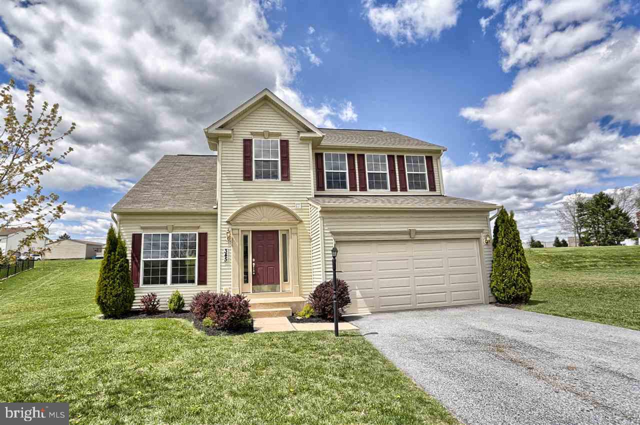 An invitation to spacious living in a prime location & realistic pricing! 4 bedrooms, 2 full/2 half baths. Vaulted ceiling in living room, wood flooring in living/dining & kitchen, Silestone counters, New double oven to be installed in the eat in kitchen which opens to the family room w/fireplace. Finished lower level & half bath. Go ahead & fall in love!