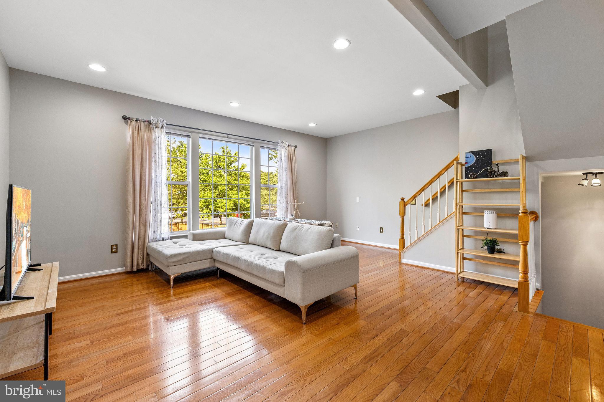 Welcome to this well maintained 3 story townhome in a quiet cul-de-sac in the highly desirable McNair Farms Subdivision of Herndon. Offering nearly 2,000 square feet of living space, this home features 3 bedrooms, 3 full baths, and 1 half bath, along with a dedicated office and a versatile recreation room on the entry level-perfect for modern living and entertaining. Enjoy sunny days and warm evenings on the deck and lower-level patio, while the bright and inviting interior showcasing cherry hardwood floors and an updated kitchen equipped with granite countertops, stainless steel appliances, and an island that opens to a cozy family room, ideal for movie nights. Host family dinners in the separate dining room, and retreat to the spacious primary suite complete with a walk-in closet and ensuite bath featuring double sinks, a soaking tub, and stand-up shower. Two additional well-appointed bedrooms share a full bathroom. The fully finished entry level also offers an office or private room, washer/dryer, and a full bath - providing endless possibilities for an in-law suite or additional recreation with garage access (which conveys a large tool cabinet). Recent upgrades, including new outdoor light fixtures, a garage door (2025) water heater (2025), and HVAC unit (2024), enhance the comfort and efficiency of this home. Located near major commuter routes, abundant shopping, plenty of dining, this move-in-ready townhome is the perfect blend of comfort and convenience, with a tot-lot, and tennis/ basketball courts. Minutes from the Village Center at Dulles, Arrowback Centre, the Silver Metro Line, Dulles Technology Corridor, and Dulles Toll Road.
Don't miss the opportunity to make this wonderful property your new home!