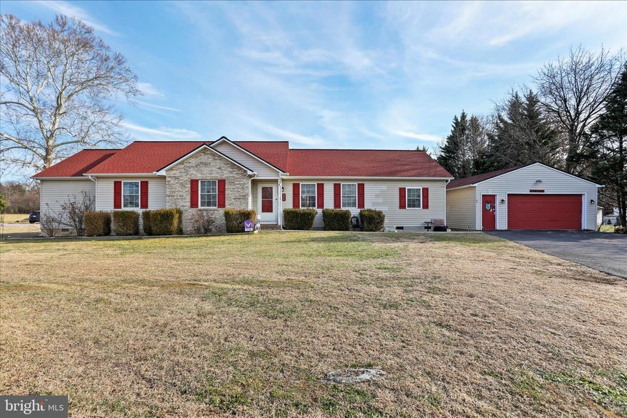 Welcome to 242 Willis Drive, a spacious single-level home that perfectly blends functionality, comfort, and unique charm. Situated on one acre in the quiet Elizabeth Station neighborhood, this property offers the ideal combination of privacy and convenience, just minutes from I-81.

Inside, the home is bright and inviting, with well-lit rooms and an open-but-traditional layout that flows naturally. A retro den/office with paneled walls adds character and versatility for work or hobbies. The master suite is truly one-of-a-kind, featuring a large jacuzzi tub visible from the bedroom, a walk-in closet, and a private master bathroom with shower/tub combo, vanity, and toilet—making it both charming and practical.

Car enthusiasts, hobbyists, or anyone needing serious storage will love the detached two-car garage with extra workspace and a recently installed 50-amp EV/RV outlet - ready for electric cars, plug-in hybrids, or your next adventure vehicle. Step outside to the back deck and enjoy the expansive yard, perfect for entertaining or simply enjoying your one-acre retreat.

With a new roof installed in 2021 and overall well-maintained condition, this home offers move-in-ready living with room to make it your own. Whether you’re looking for land, garage space, or one-level convenience, 242 Willis Drive delivers — schedule your private showing beginning January 16th!