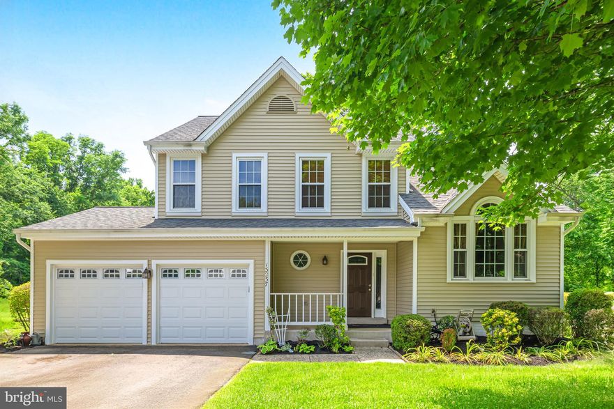 Welcome to 13237 Ladybank Lane, a beautifully appointed home in the sought-after Chantilly Highlands community of Oak Hill, VA with highly rated Oak Hill ES/Franklin or Carson MS and Chantilly HS pyramid. This exquisite residence, fully renovated inside and out, offers a harmonious blend of style and comfort. As you approach, the welcoming covered front porch sets the stage for what's inside. The main level features gleaming oak hardwood floors and a soaring cathedral ceiling in the living and dining areas, flooding the space with natural light. The fully renovated kitchen boasts transitional finishes, including granite countertops, stainless steel appliances, shaker-style wood-toned cabinets, and a stylish backsplash. This chef's kitchen flows seamlessly into a cozy family room with a gas fireplace great for relaxing.  The upper level continues to impress with a primary ensuite that features more cathedral ceilings, dual closets, and a fully renovated bathroom with on-trend finishes. Two additional bedrooms and a fully renovated hall bathroom complete this level. The finished basement offers a large recreation room, a bonus room ideal for a guest bedroom or home office, a powder room, and a laundry area. With 9-foot ceilings, this space is both welcoming and functional.  Outside, the stunning Trex deck and stone patio offer the perfect space for entertaining. Nestled on an extra-large flat lot backing to woods, this home provides ample space for outdoor activities and unparalleled privacy. Don't miss this rare opportunity!  Replaced, roof, HVAC, windows, siding, trim and doors.  Residents of Chantilly Highlands enjoy a wealth of amenities including a pool with diving board and lap lanes, a competitive summer swim team, a park, tennis courts, and walking trails nearby. Thomas Jefferson bus depot within walking distance. Easy access to Silver Line Metro, Dulles Toll Road, Route 28 and Fairfax County Parkway commuter routes and shopping and dining within walking distance.