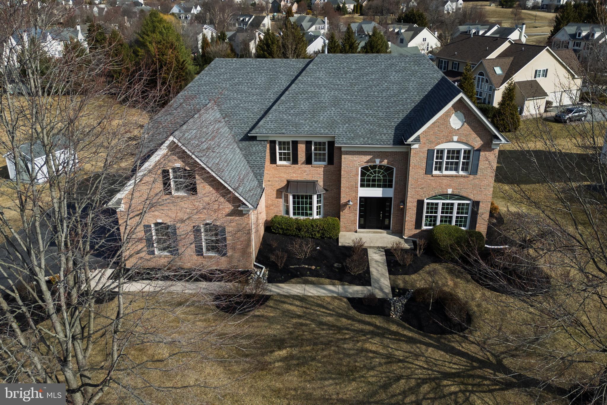 **Open House Canceled for Saturday** Welcome to 9 Corbin Drive, an exquisite estate home in the award-winning Great Valley School District. Located in the Ridings at Malvern Hunt, this brick colonial home has one of the largest floorplans in the neighborhood, offering a magnificent, light-filled home. This home has been meticulously maintained, with only one prior owner. Distinctive features, including crown molding, chair rails and skylights, are abundant in this superb home. When you walk into this stately home, you are immediately greeted by a soaring two-story foyer with a butterfly staircase. Moving past the dining room and living room you will find a two-story family room with floor-to-ceiling windows and a gas fireplace, along with a large first-floor home office. The crown jewel of the first floor is the expansive kitchen, perfect for entertaining. The kitchen contains numerous upgrades, including glass cabinetry and an expanded island with bar seating. Located off the kitchen is a beautiful sunroom with gorgeous, sweeping views of the neighborhood and rolling Chester County hills. The views from this home are truly magnificent. A powder room, laundry room and three-car garage complete the first floor. Moving upstairs you will find four large bedrooms with three full bathrooms. The owner’s retreat is truly a private oasis, with a tray ceiling, a separate sitting room, two large walk-in closets and a well-appointed master bathroom. A second bedroom contains an en-suite bathroom, while the third and fourth bedrooms share a Jack-and-Jill bathroom. The Malvern Hunt community is situated in a charming location off Swedesford Road in East Whiteland Township. Bacton Hill Park is a half mile away in one direction, and Exton Park with access to the Chester County Trail is located within a mile in the other direction. You’ll also enjoy convenient access to Route 202 for easy trips to King of Prussia or West Chester. Schedule your appointment today to see this beautiful must-see home.