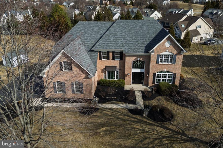 **Open House Canceled  for Saturday** Welcome to 9 Corbin Drive, an exquisite estate home in the award-winning Great Valley School District. Located in the Ridings at Malvern Hunt, this brick colonial home has one of the largest floorplans in the neighborhood, offering a magnificent, light-filled home.  This home has been meticulously maintained, with only one prior owner. Distinctive features, including crown molding, chair rails and skylights, are abundant in this superb home. When you walk into this stately home, you are immediately greeted by a soaring two-story foyer with a butterfly staircase. Moving past the dining room and living room you will find a two-story family room with floor-to-ceiling windows and a gas fireplace, along with a large first-floor home office. The crown jewel of the first floor is the expansive kitchen, perfect for entertaining. The kitchen contains numerous upgrades, including glass cabinetry and an expanded island with bar seating. Located off the kitchen is a beautiful sunroom with gorgeous, sweeping views of the neighborhood and rolling Chester County hills. The views from this home are truly magnificent. A powder room, laundry room and three-car garage complete the first floor. Moving upstairs you will find four large bedrooms with three full bathrooms. The owner’s retreat is truly a private oasis, with a tray ceiling, a separate sitting room, two large walk-in closets and a well-appointed master bathroom. A second bedroom contains an en-suite bathroom, while the third and fourth bedrooms share a Jack-and-Jill bathroom. The Malvern Hunt community is situated in a charming location off Swedesford Road in East Whiteland Township. Bacton Hill Park is a half mile away in one direction, and Exton Park with access to the Chester County Trail is located within a mile in the other direction. You’ll also enjoy convenient access to Route 202 for easy trips to King of Prussia or West Chester.  Schedule your appointment today to see this beautiful must-see home.