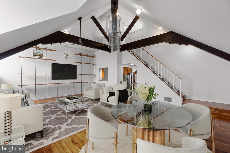 Welcome to this truly unique 1-bedroom condo located in the heart of Bolton Hill, one of Baltimore’s most sought-after historic neighborhoods. Located on the Penthouse level of the building this desirable unit is also situated in a more secluded wing, offering added privacy with fewer shared walls than many other units in the building. At approximately 1,021 square feet, it is one of the larger units in the building.  The entire HVAC system was also replaced in 2025 for added comfort and peace of mind. Blending timeless architectural character with modern conveniences, this distinctive home features gorgeous hardwood floors throughout and dramatic high ceilings with exposed beams that create an open, loft-like feel filled with charm and character.

The main level offers a functional galley kitchen with a pass-through to the dining area, creating an open flow for everyday living and entertaining. A convenient half bath and dedicated laundry room on the main level add practicality and ease. Upstairs, the spacious owner’s suite features a large closet and a full bathroom, providing a comfortable private retreat.

Set within one of Baltimore’s stunning historic buildings, residents enjoy access to desirable amenities including a fitness center and recreation room. Ideally located just blocks from Penn Station, Maryland Institute College of Art, Johns Hopkins University, and Joseph Meyerhoff Symphony Hall, and surrounded by local dining, coffee shops, and boutiques, this home offers an exceptional opportunity to enjoy vibrant city living in a historic setting.  Mortgage savings may be available for buyers of this listing.